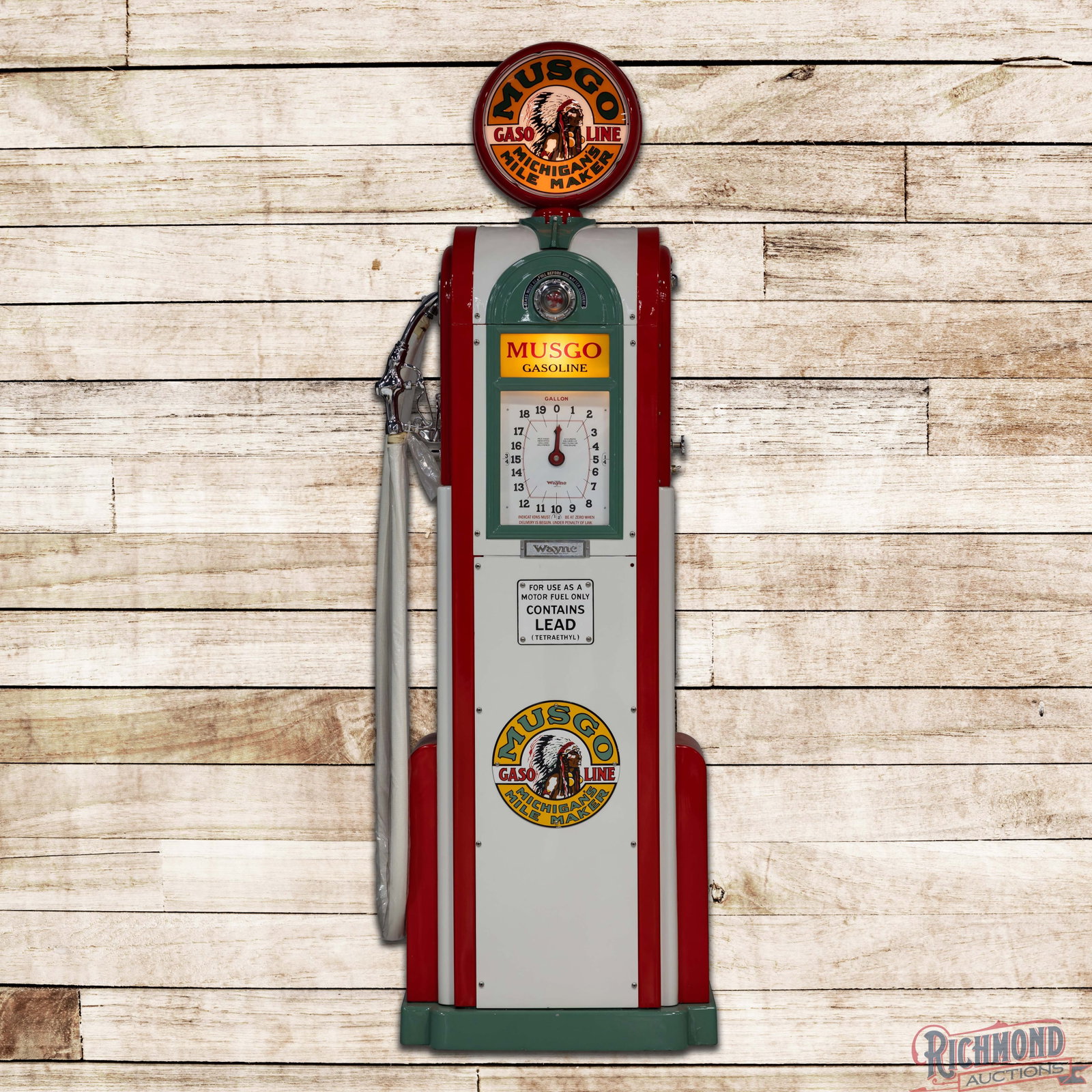 Wayne Model #866 Clock Face Gas Pump Restored Musgo: Professionally restored. Vibrant paint with high gloss, highly detailed appointments, new cloth hose, polished nozzle, reproduction globe. 96" H. Condition: Professionally Restored. All items are guar