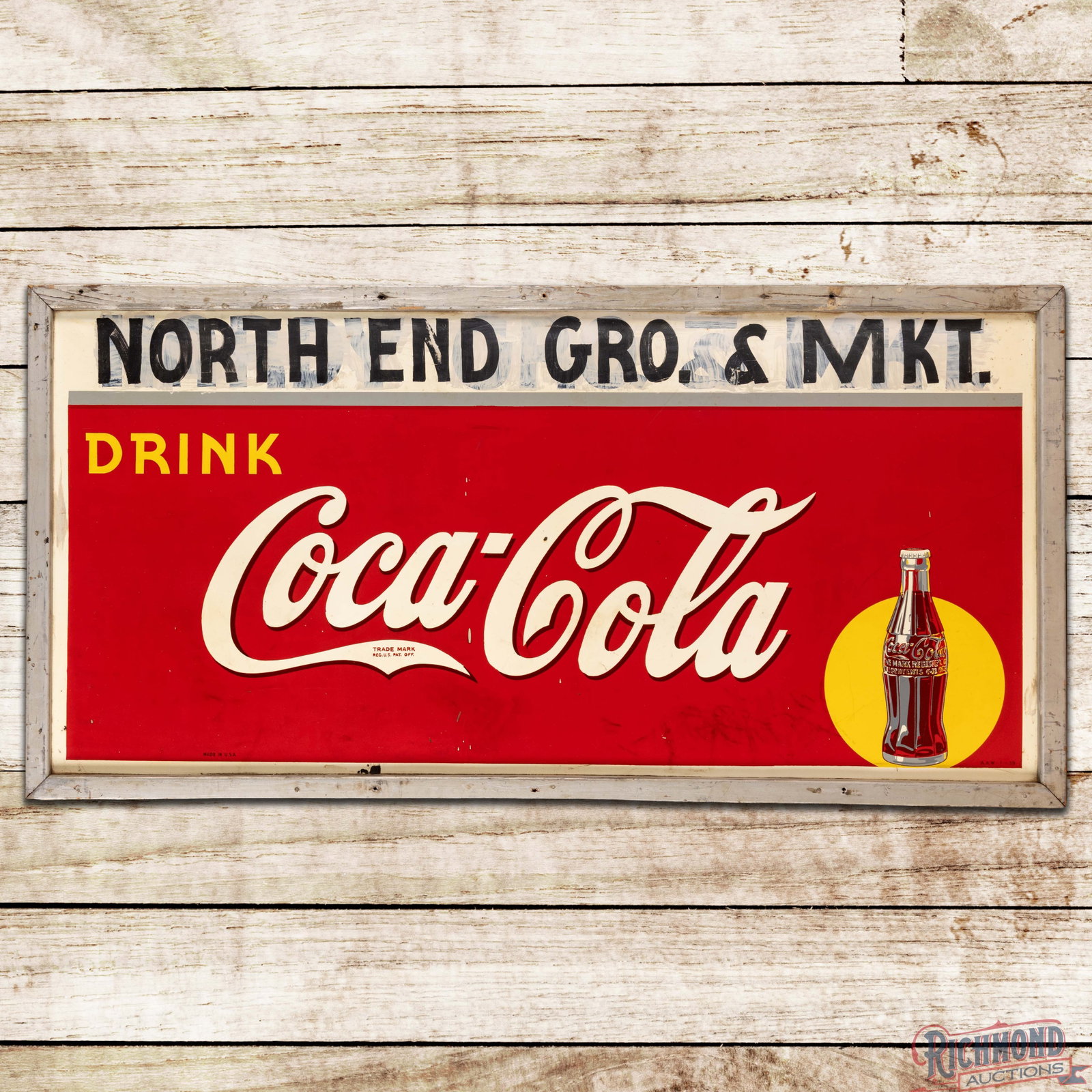 1939 Drink Coca Cola 6' North End Gro. & Mkt. 6' Single Sided Tin Sign w/ Bottle & Sun Logo: SST (single sided tin) sign with the original wooden frame has very good color and shine. The field has a small ding with a paint chip in the "C" of Cola, errant paint drips, fine scratches and areas 