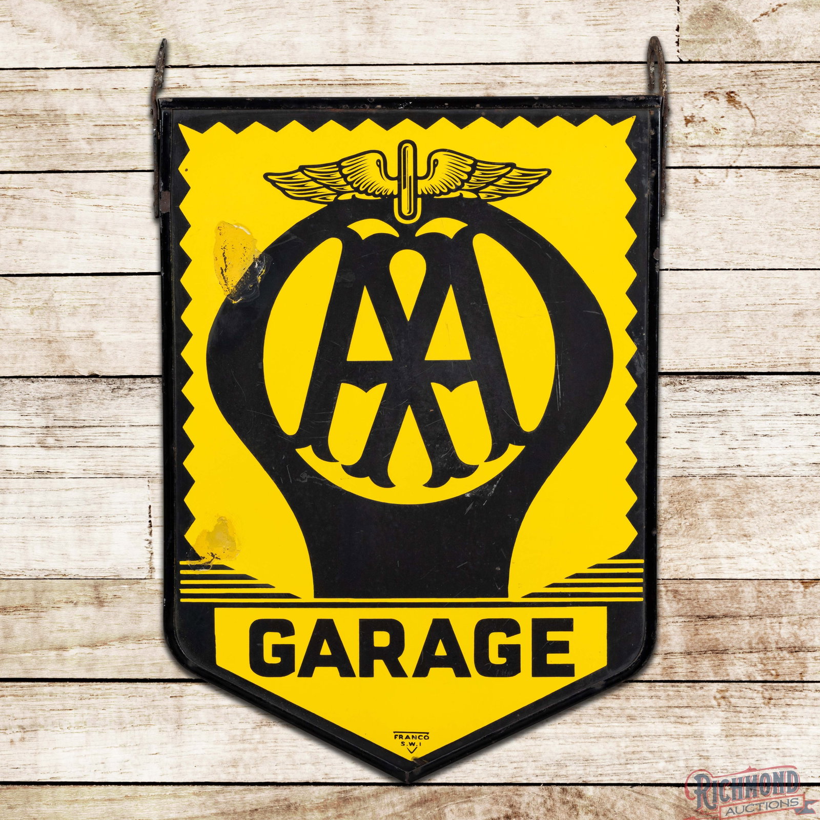 AA Garage Double Sided Porcelain Sign w/ Frame "Winged Logo": DSP (double sided porcelain) sign with the factory frame and hangers has excellent color and gloss. The display is clean with minor surface imperfections. The reverse has scratches in the field with t
