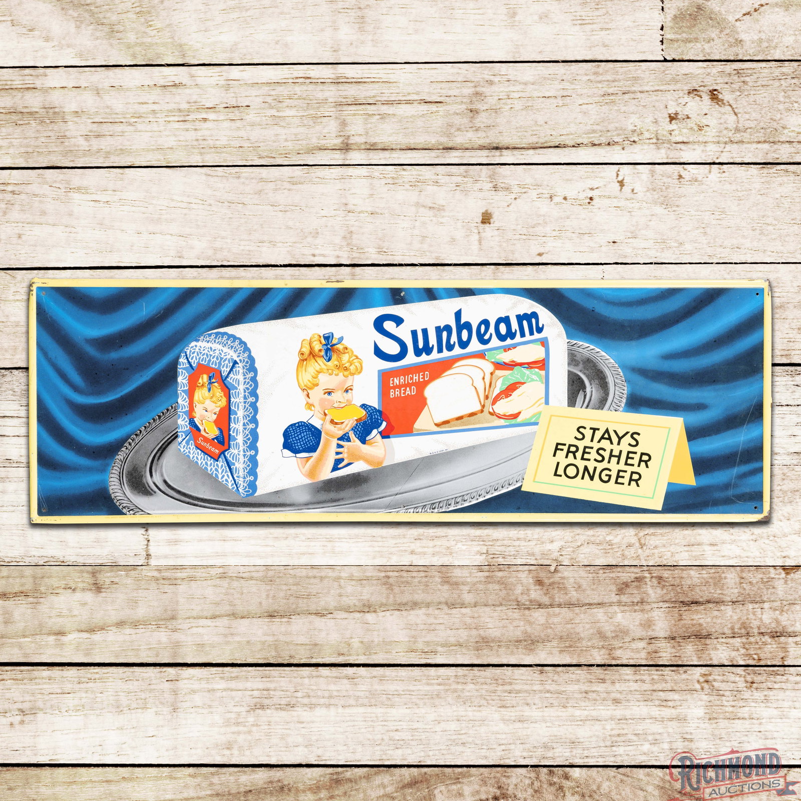 1956 Sunbeam Enriched Bread 4.5' Emb. Single Sided Tin Sign w/ Loaf & Platter: SST (single sided tin) self-framed sign has excellent color and shine. The field has light surface wear with scuffs, spotting and fine scratches in the outer fields. The perimeter has larger scratches