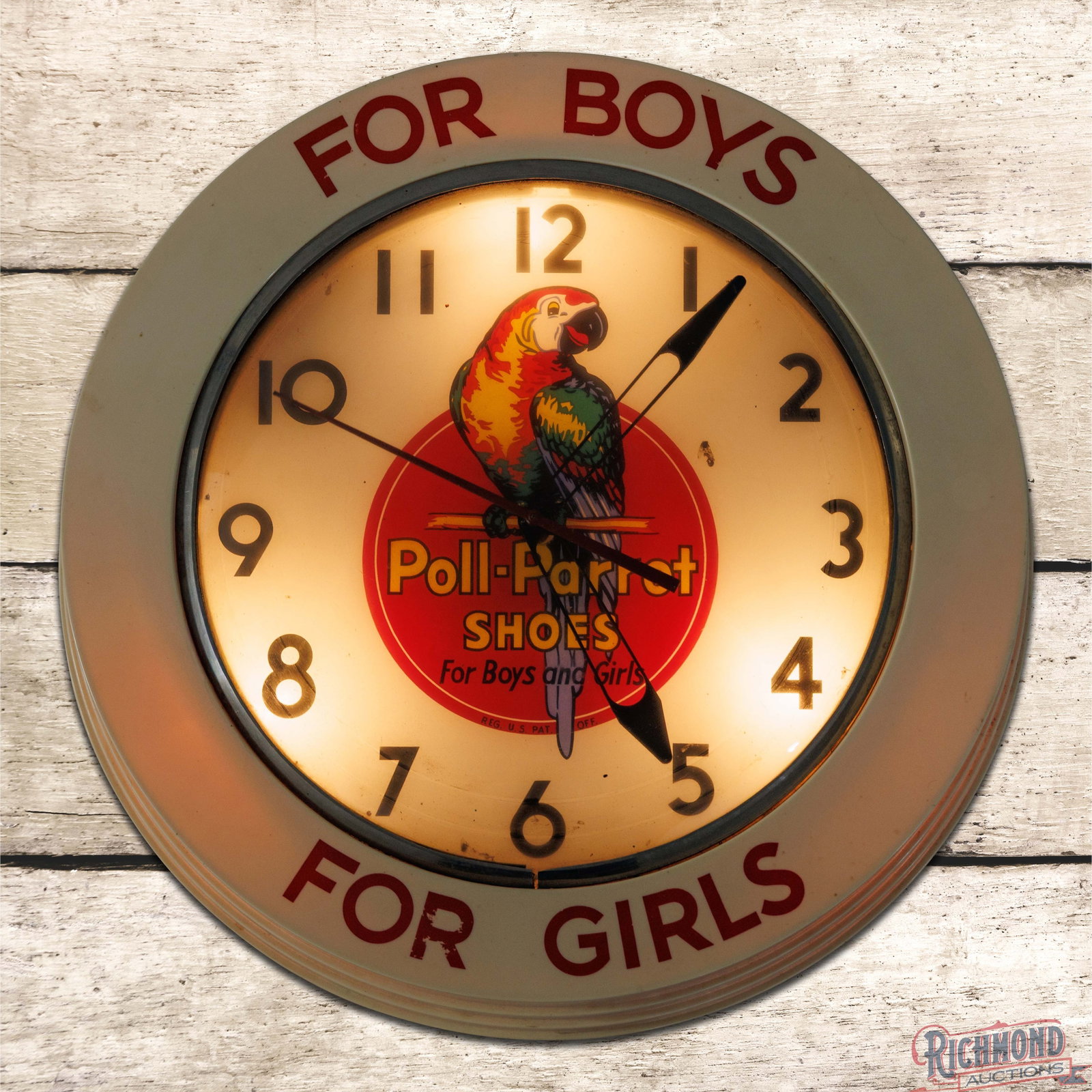 Poll Parrot Shoes for Boys and Girls 19" Lighted Advertising Clock: Lighted advertising clock works as it should. The inner face has bright colors with a wonderful parrot graphic. The face has light wear with trapped debris. The perimeter lettering has small paint chi