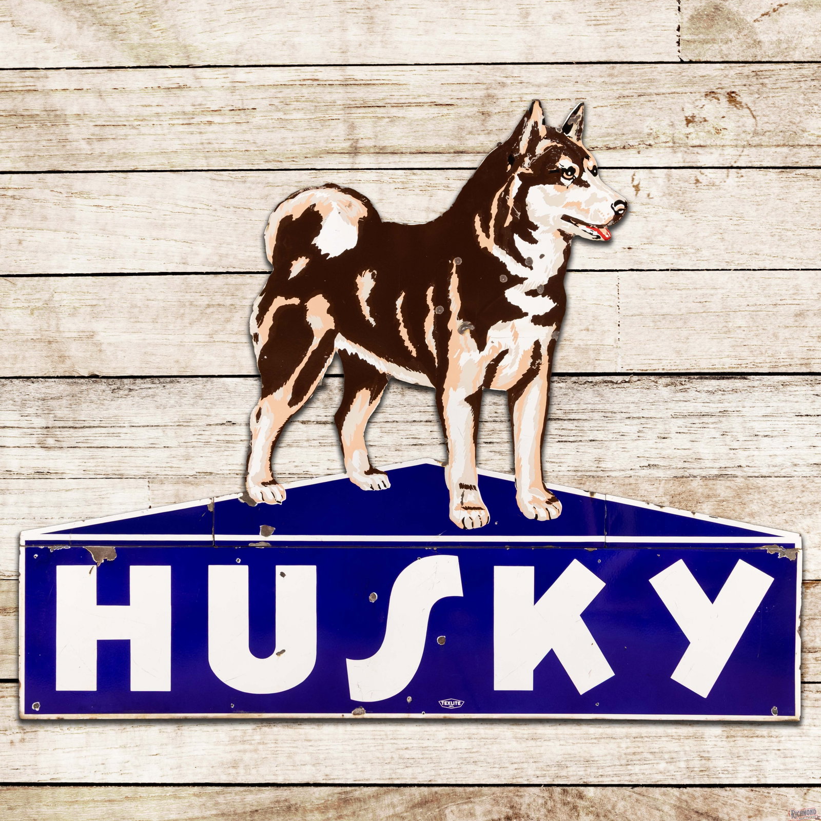 Husky Gasoline Die Cut Single Sided Porcelain Service Station Sign w/ Dog: SSP (single sided porcelain) multi-piece signs with cookie cutter edges have very good color and gloss. The dog exhibits chips, a hit above one front leg, minor crazing and a bend on the tip of one ea
