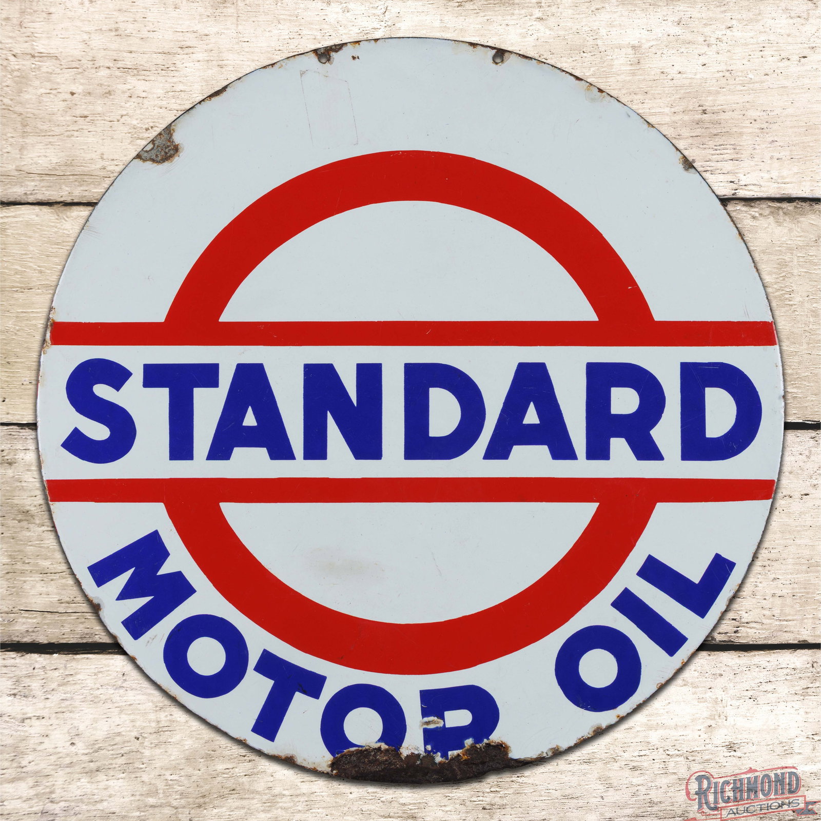 Standard Motor Oil 24" Double Sided Porcelain Sign: DSP (double sided porcelain) sign has good color and gloss. The display has surface wear with an area of discoloration in the lower field. The perimeter has chips with crazing and a bend with minor me