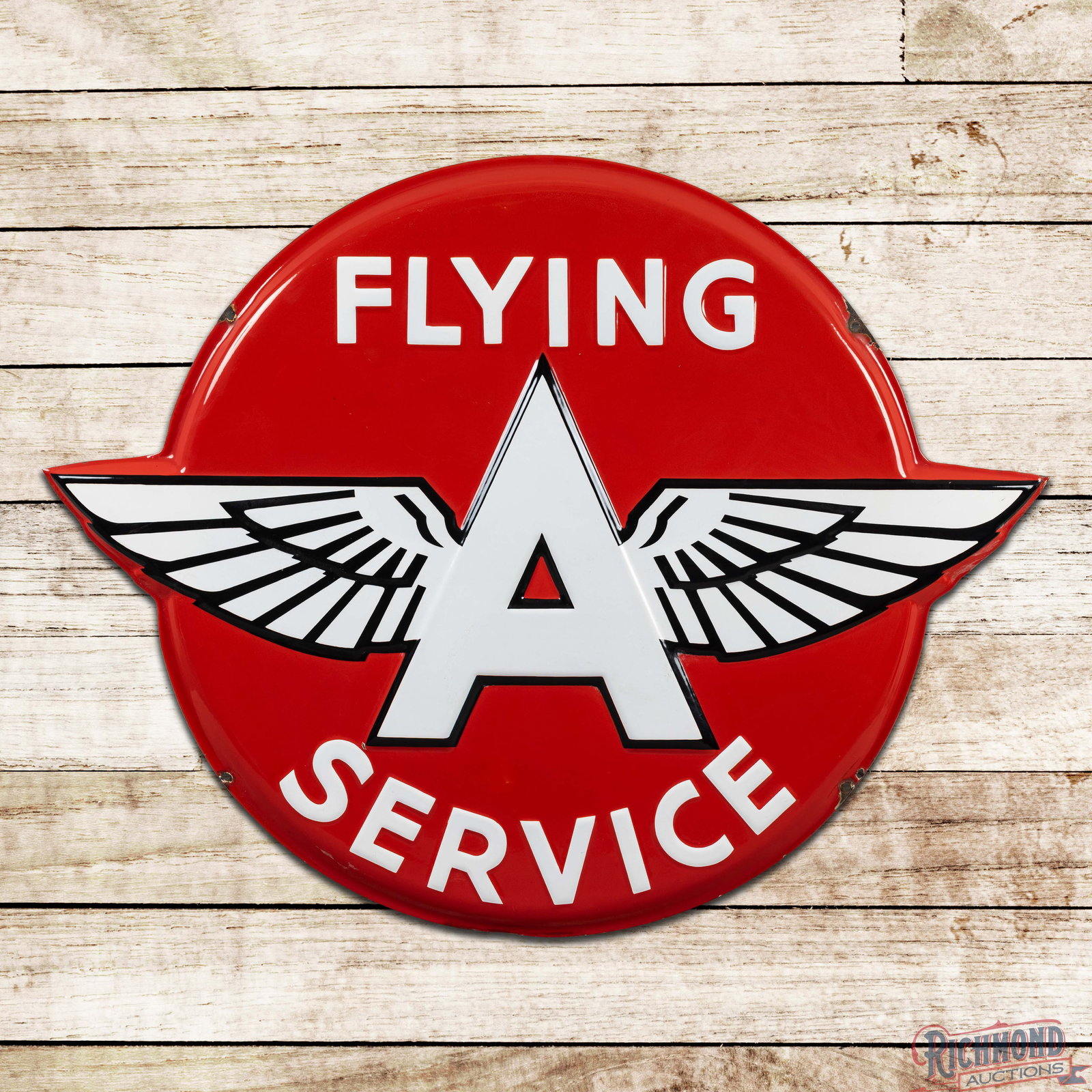 Flying A Gasoline Service 4' Emb. Single Sided Porcelain Logo Button Sign: SSP (single sided porcelain) embossed die cut sign has excellent color and gloss. The display is exceptionally clean with a small chip in the lower left outer field and a tiny factory blemish below th