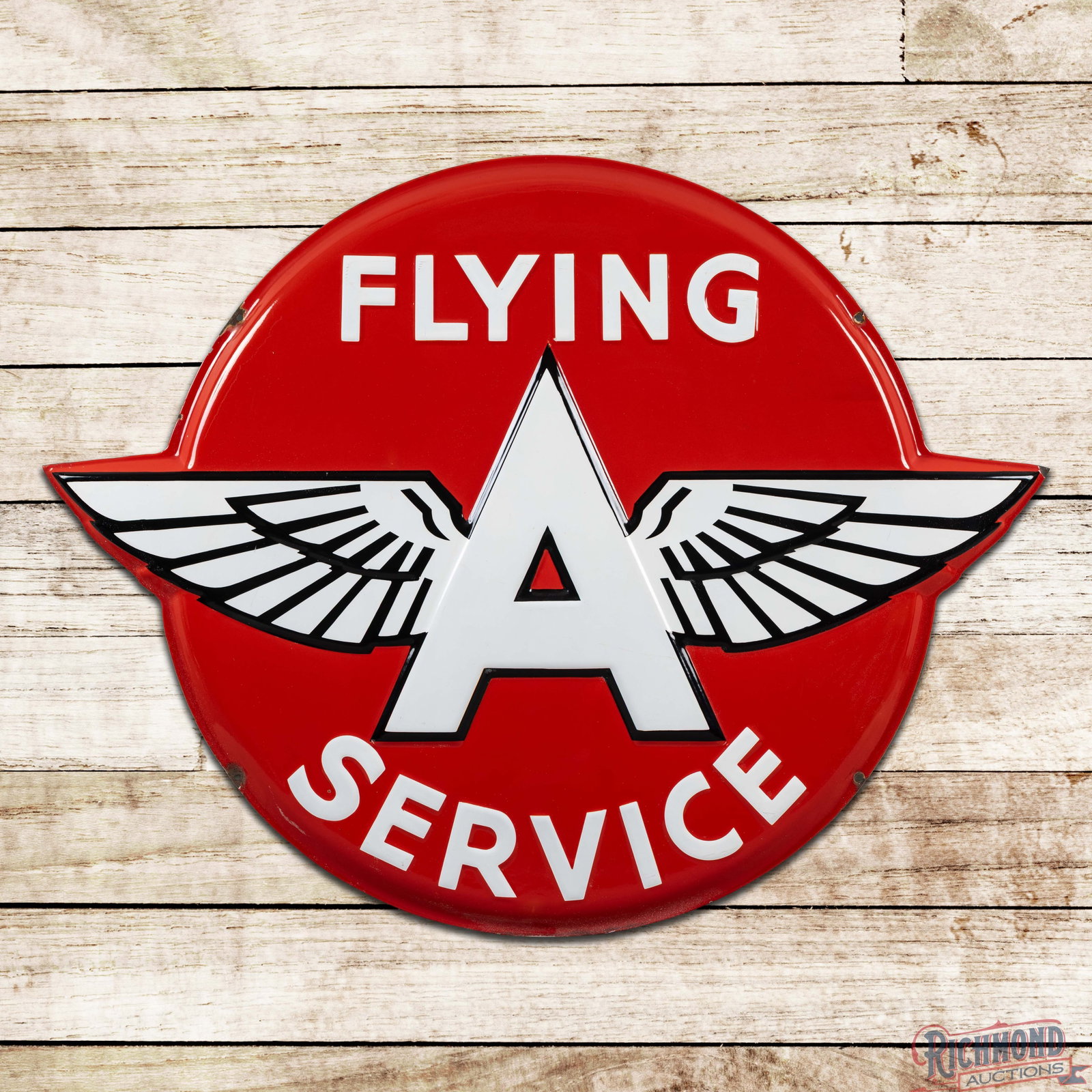 Flying A Gasoline Service 48" Emb. Single Sided Porcelain Button Sign w/ Logo: SSP (single sided porcelain) embossed die cut sign has excellent color and gloss. The display is very clean overall, with light surface wear and tiny chips. The perimeter has chips at the mounting hol