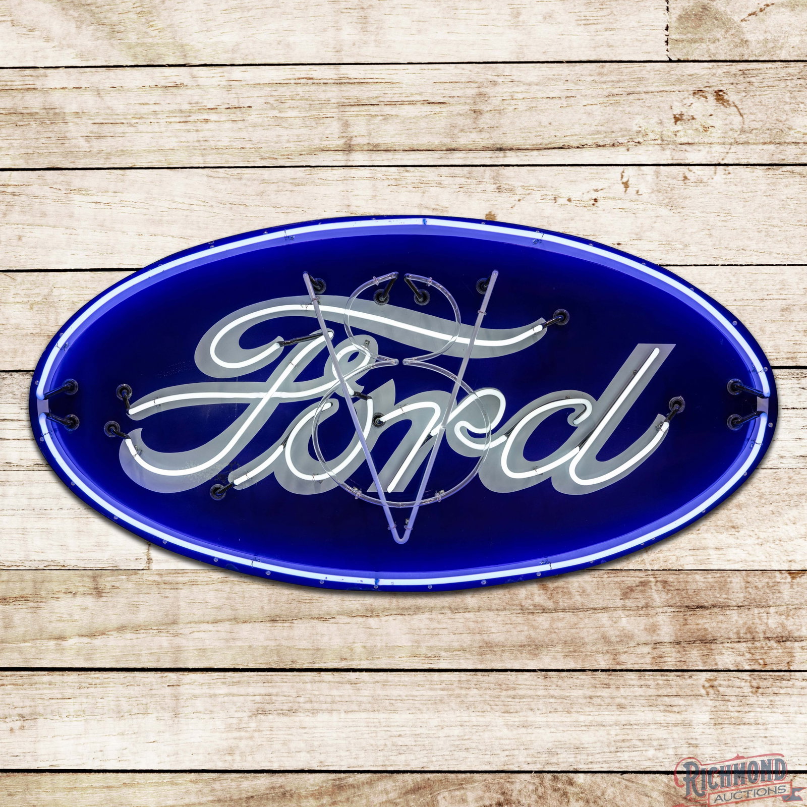Ford Automobiles 6' Single Sided Porcelain Factory Neon Sign "Sequenced Flash": SSP (single sided porcelain) factory neon sign mounted on a new metal can has excellent color and gloss. The sign features factory Ford and perimeter neon with added "V-8" neon. The neon presents with