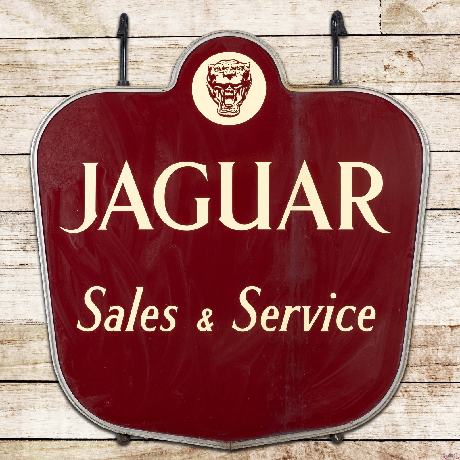 Jaguar Sales & Service 44" Double Sided Porcelain Sign w/ Factory Frame: 2 SSP (single sided porcelain) die cut signs mounted back to back in the original frame have excellent color and gloss. The display has a clean field and perimeter with minor discoloration along the u