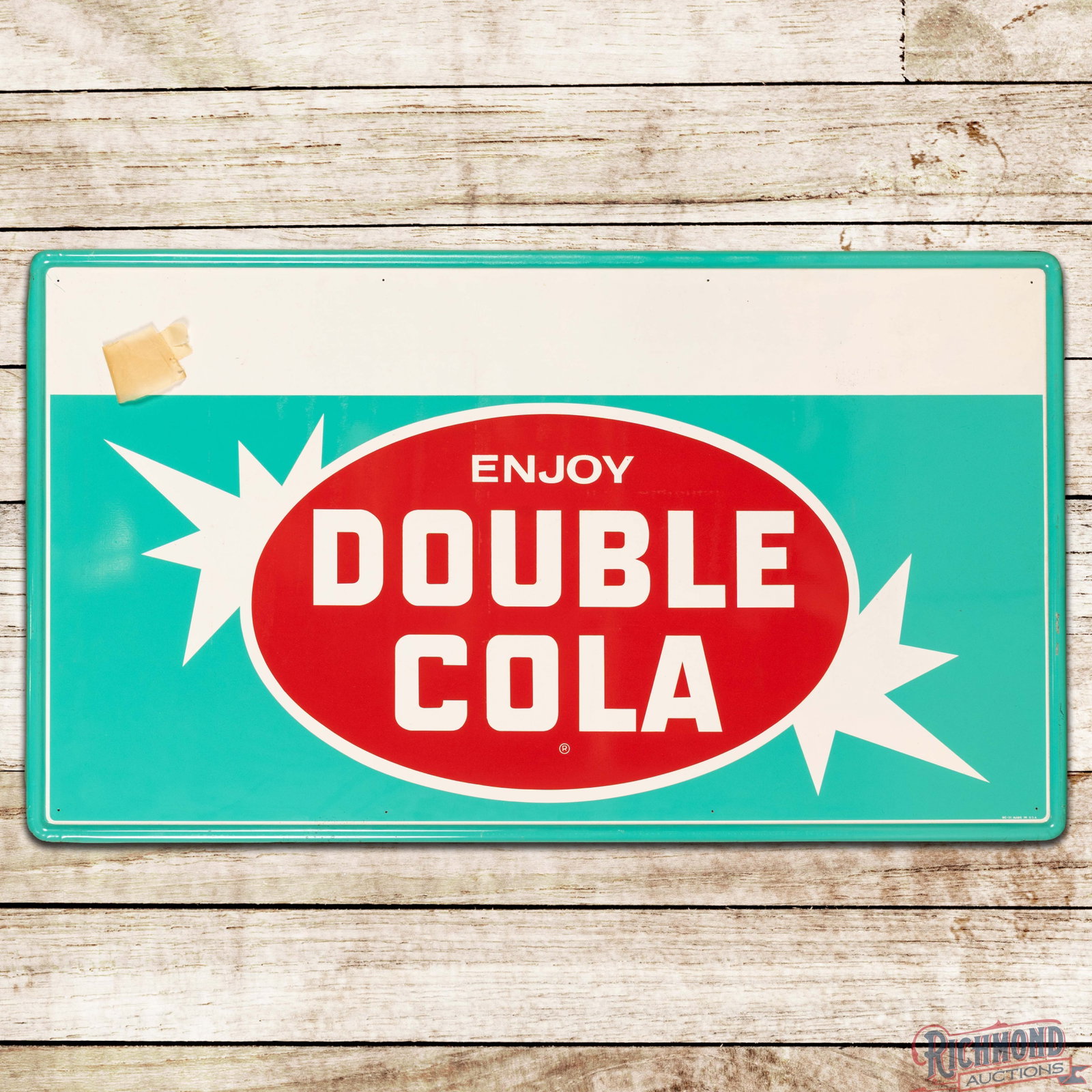 NOS Enjoy Double Cola Single Sided Tin Sign w/ Logo: NOS (new old stock) SST (single sided tin) self-framed sign has excellent color and shine. The field is very clean overall with faint paper marks and small factory imperfections. The perimeter is very