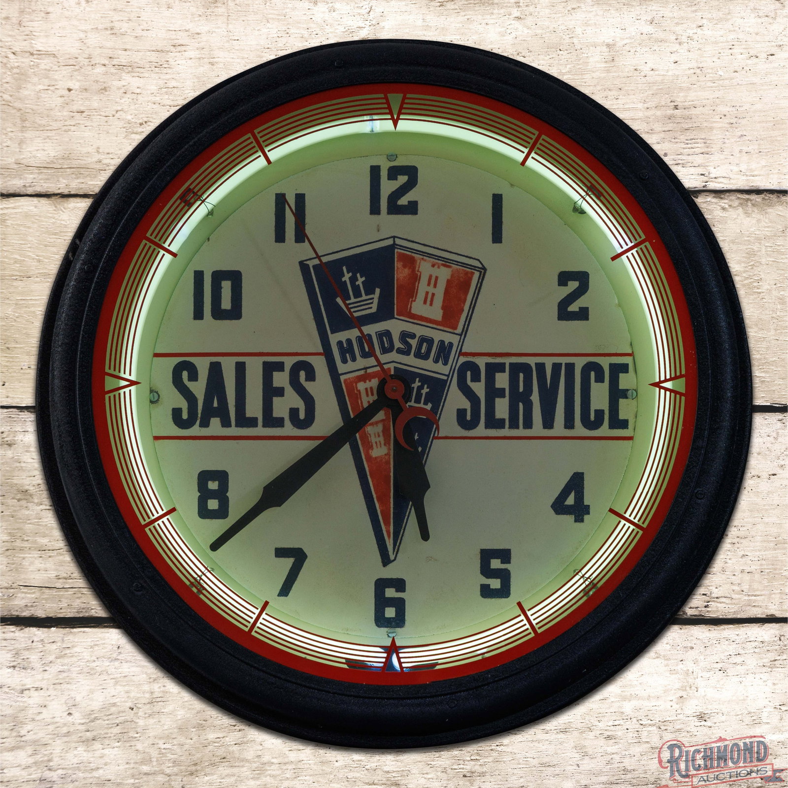 Hudson Sales Service 21" Neon Advertising Clock w/ Logo: Neon advertising clock works as it should. The inner face has good color with wash to red painted areas of the logo, color match to the red lines in the left and right fields and an applied clear coat