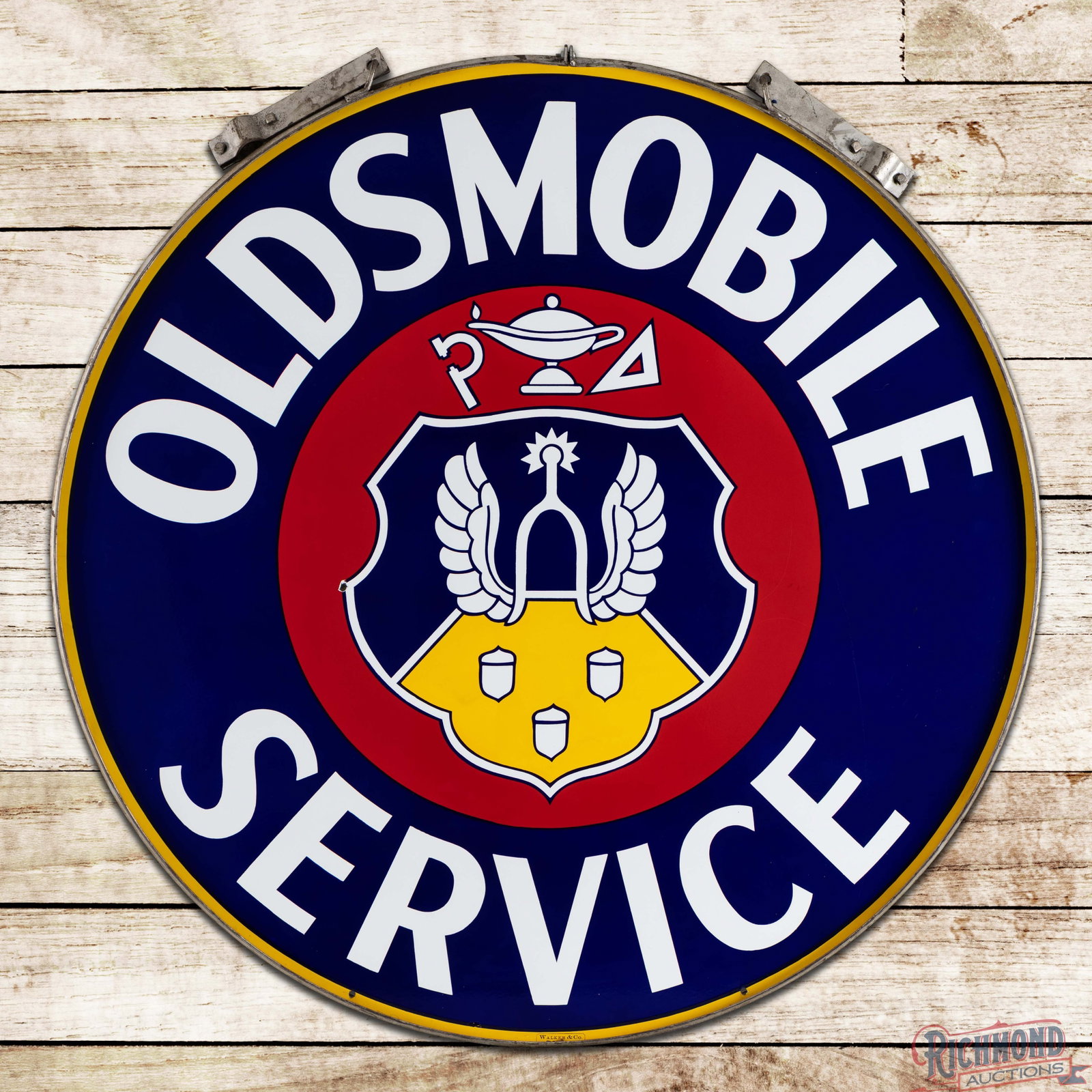 Amazing Oldsmobile Service 5' Double Sided Porcelain "Crest Logo" Sign w/ Ring: DSP (double sided porcelain) sign with the factory ring has outstanding color and gloss. Side #1 is exceptionally clean with a small chip by the "S" in Service in the lower outer field. The revere has