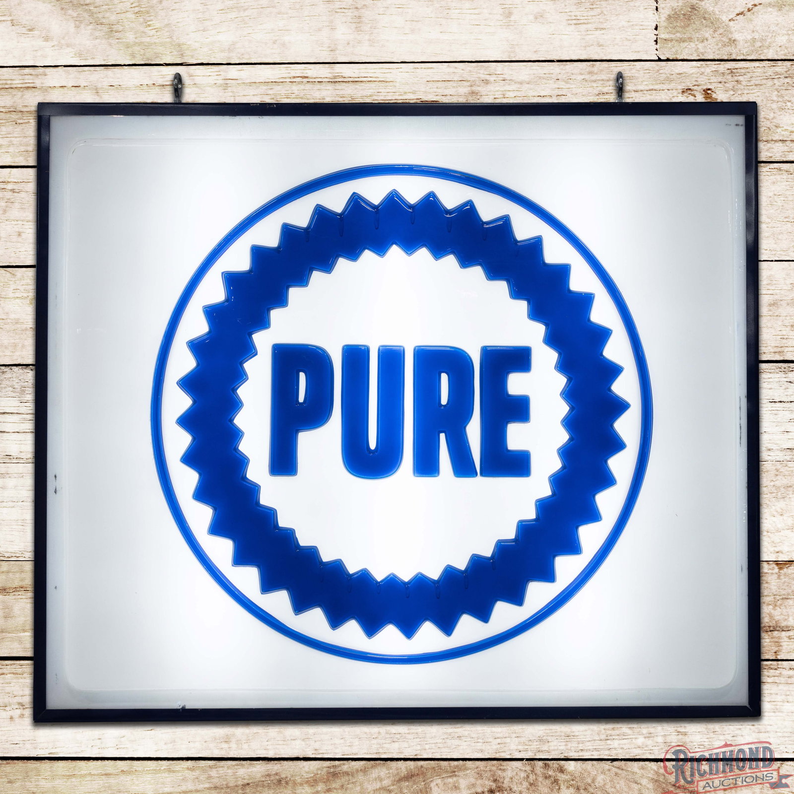 Pure Gasoline 4' Emb. Plastic Lighted Sign w/ Logo: Single sided embossed plastic internally lighted sign with metal can works correctly. The sign has excellent color with light surface wear in the fields. The perimeter has scuffs with areas of minor p