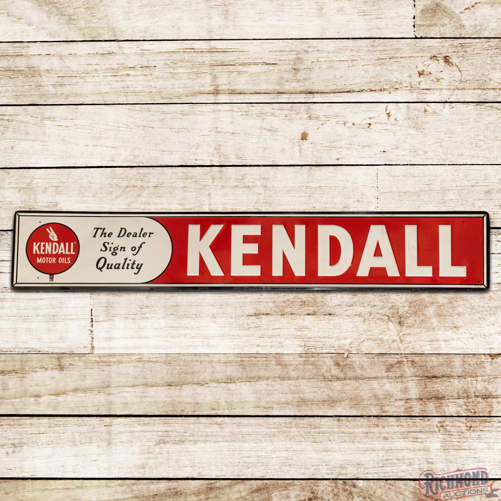 Kendall Motor Oils "The Dealer Sign of Quality" 6' Emb. Single Sided Tin Sign w/ Logo: SST (single sided tin) embossed self-framed sign has excellent color and shine. The display has fine scratches and marks in the right fields with a bend near the logo in the left field. The perimeter 