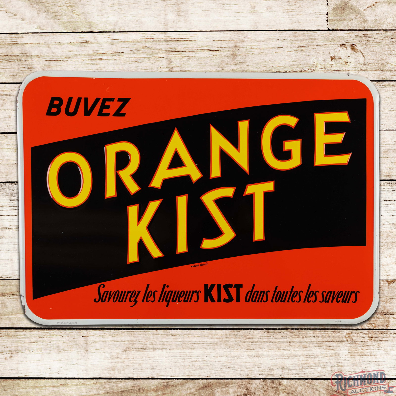1950 Buvez Orange Kist Emb. Single Sided Tin Sign: SST (single sided tin) embossed sign has excellent color and shine. The field has minor surface imperfections with a tiny paint chip by the "A" in Orange. The perimeter has light wear with paint chips