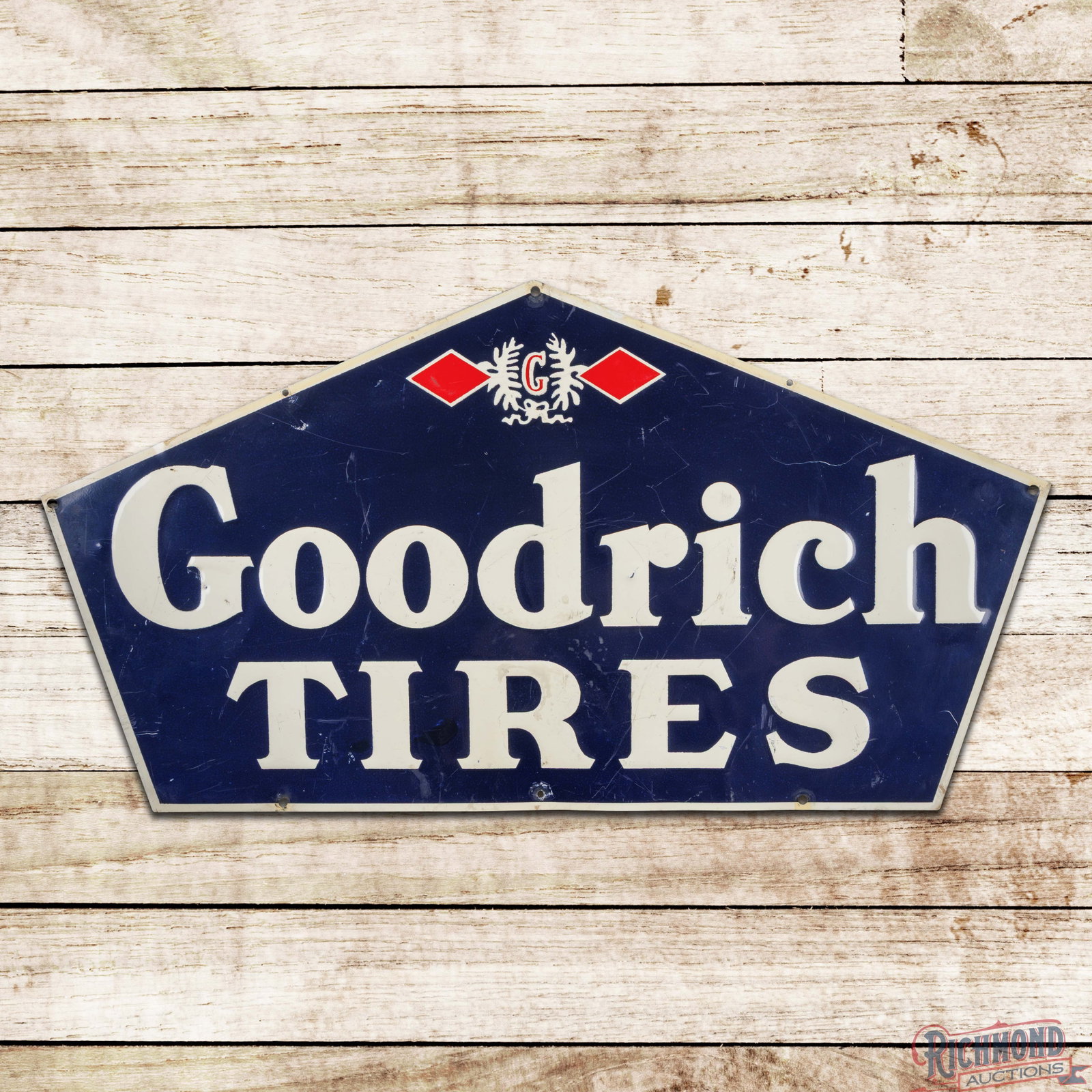 Goodrich Tires Emb. Single Sided Tin Sign w/ Logo: SST (single sided tin) embossed die cut sign has very good color and shine. The display has scratches with small areas of discoloration. The outer fields have small indentations with minor bends at th