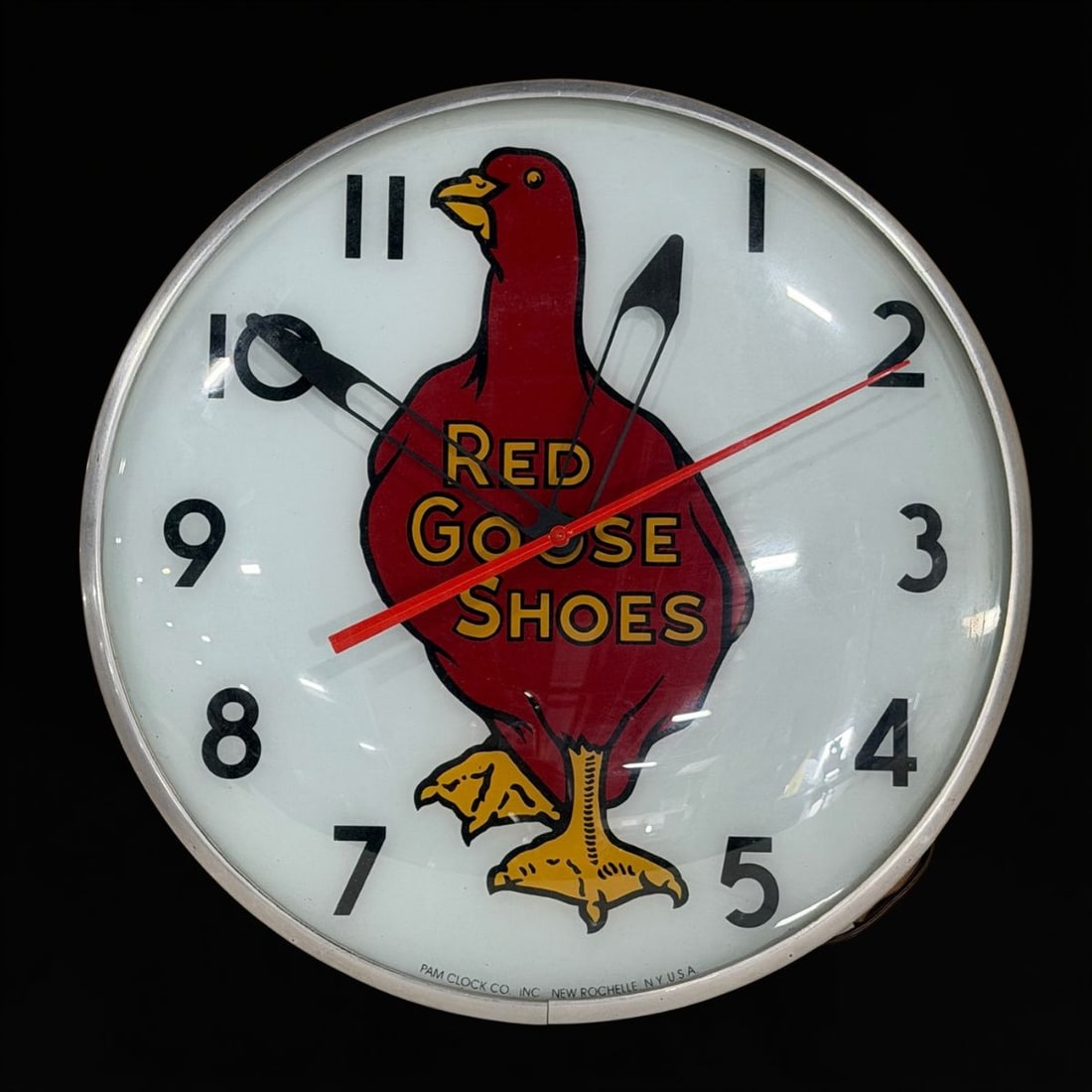 Red Goose Shoes Pam Clock: Red goose shoes pam clock. Mechanism is working and lights up. 15" H x 5" W. All items are eligible for free delivery to Rustbelt Americana in East Moline, IL on 8/6-7 or other shows that Richmond Auc