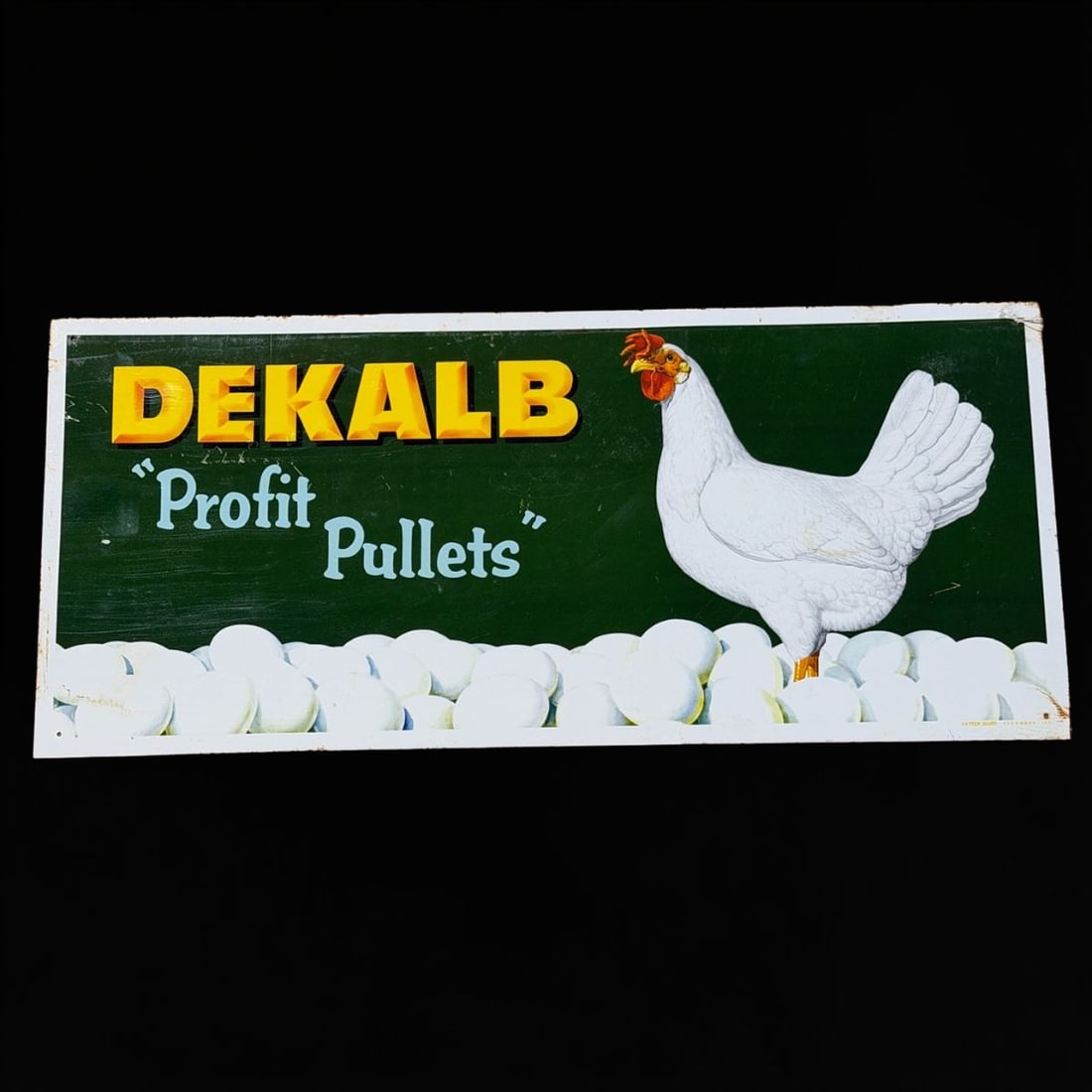 Dekalb Profit Pullets Tin Metal Sign: Marked Patten Signs. Reproduction. 28" H x 13" W. All items are eligible for free delivery to Rustbelt Americana in East Moline, IL on 8/6-7 or other shows that Richmond Auctions attends. Size 28" H