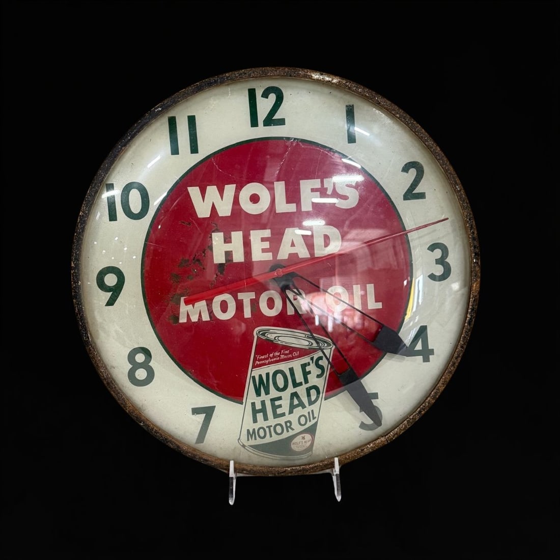 Wolfs Head Motor Oil Light Up Clock: Light comes on, mechanism does not work. 15" H. All items are eligible for free delivery to Rustbelt Americana in East Moline, IL on 8/6-7 or other shows that Richmond Auctions attends. Size 15" H Med