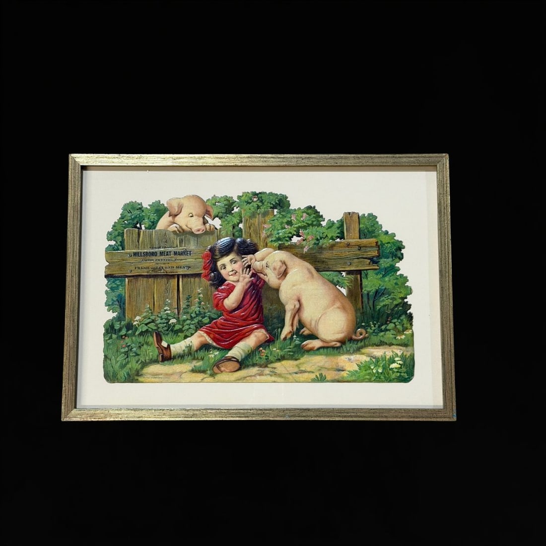 Framed Hillsboro Meat Market Cardboard Sign: Excellent condition with great pig graphics. Bottom left says printed in Germany. 20" H x 14" W. All items are eligible for free delivery to Rustbelt Americana in East Moline, IL on 8/6-7 or other