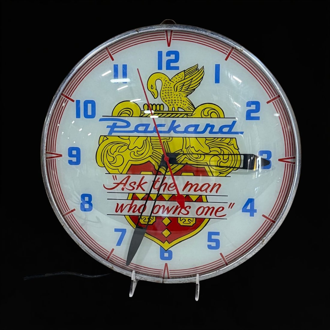Packard As A Man Who Owns One Light Up Clock: Lights up and mechanism works as it should.. 15" H x 4" W. All items are eligible for free delivery to Rustbelt Americana in East Moline, IL on 8/6-7 or other shows that Richmond Auctions attends.