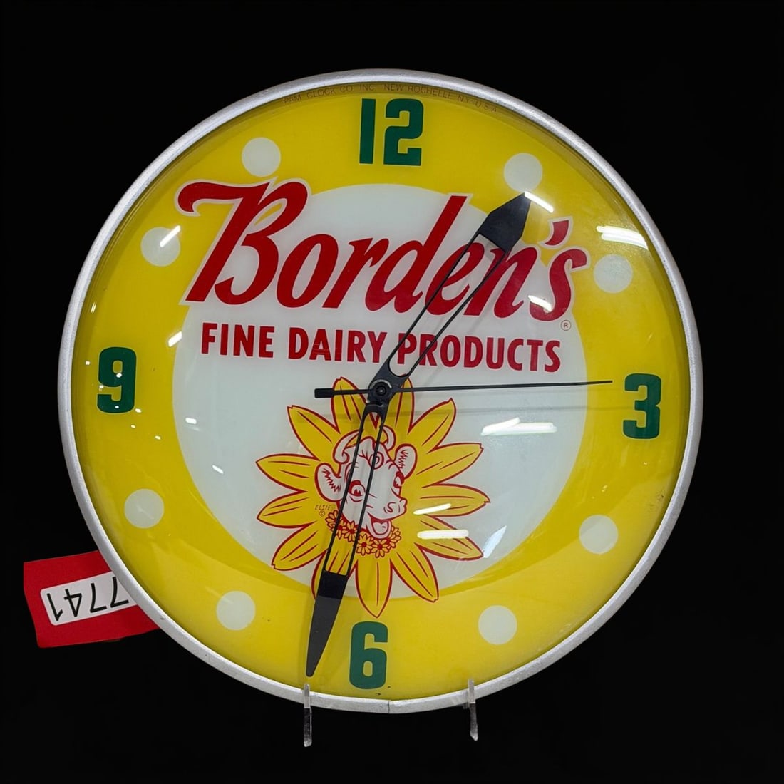 Borden's Fine Dairy Products: Works as it should, clean face, lights up. 15" H. All items are eligible for free delivery to Rustbelt Americana in East Moline, IL on 8/6-7 or other shows that Richmond Auctions attends. Size 15" H M