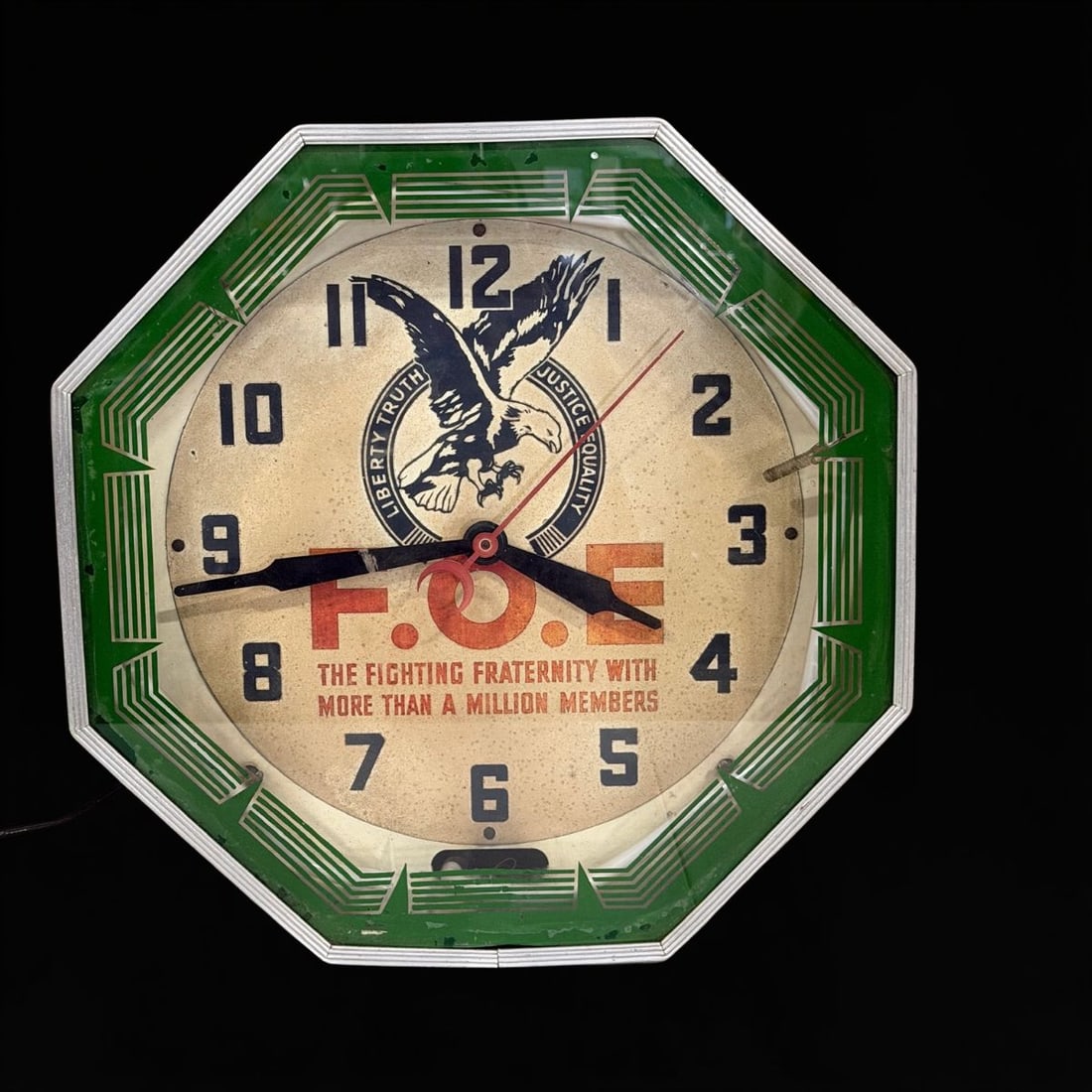 Foe Fighting Fraternity Neon Clock: Neon is broken and clock mechanism does not work. Significant wear on face. 18" H x 18" W x 6" D. All items are eligible for free delivery to Rustbelt Americana in East Moline, IL on 8/6-7 or other sh