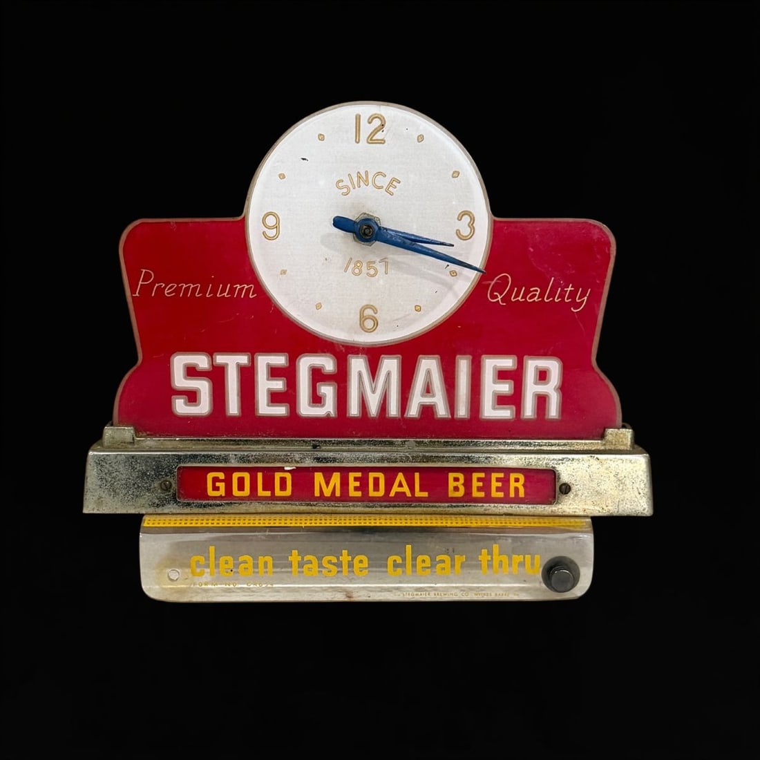 Stegmaier Gold Medal Beer Clock: Clock mechanism doesn't work, light does. 9" H x 10" W x 3" D. All items are eligible for free delivery to Rustbelt Americana in East Moline, IL on 8/6-7 or other shows that Richmond Auctions attends.