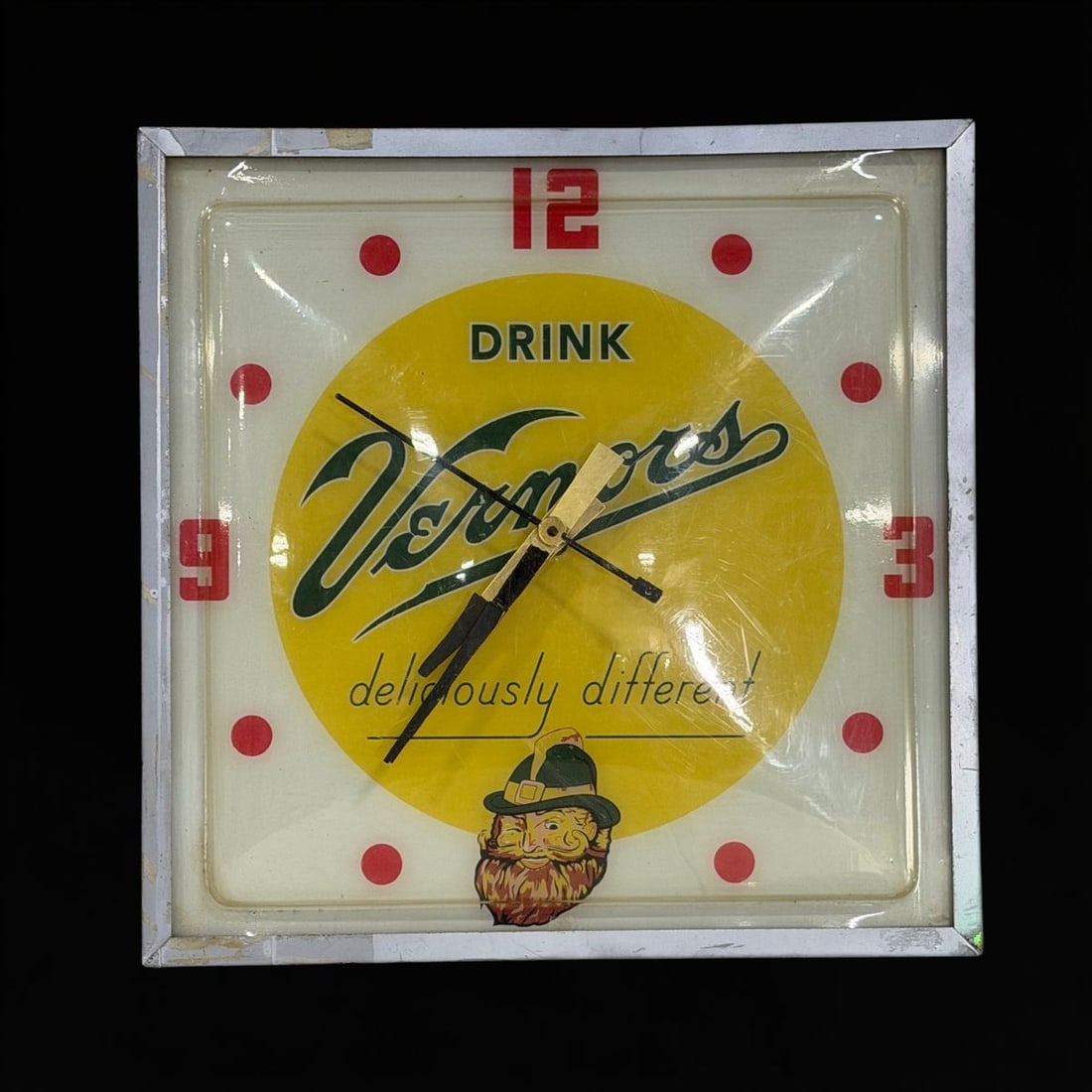 Drink Vernors Plastic Face Light Up Clock: Light comes on and clock mechanism is working. Plastic face has light scratching throughout. 15" H x 15" W x 4" D. All items are eligible for free delivery to Rustbelt Americana in East Moline, IL on 