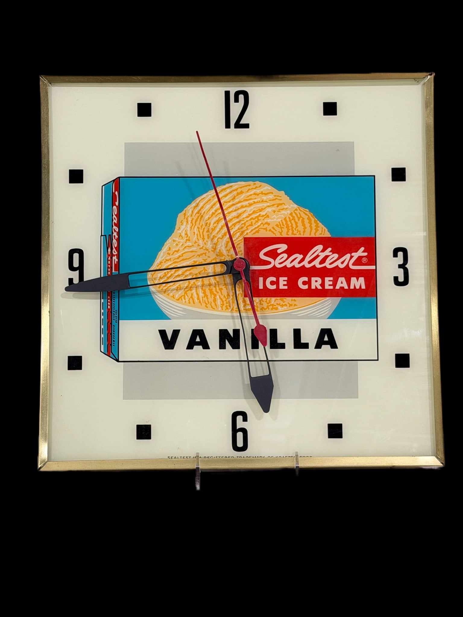 Sealtest Ice Cream Light Up Clock: Lights up but clock mechanism does not work. Missing front glass. 15" H. All items are eligible for free delivery to Rustbelt Americana in East Moline, IL on 8/6-7 or other shows that Richmond Auction