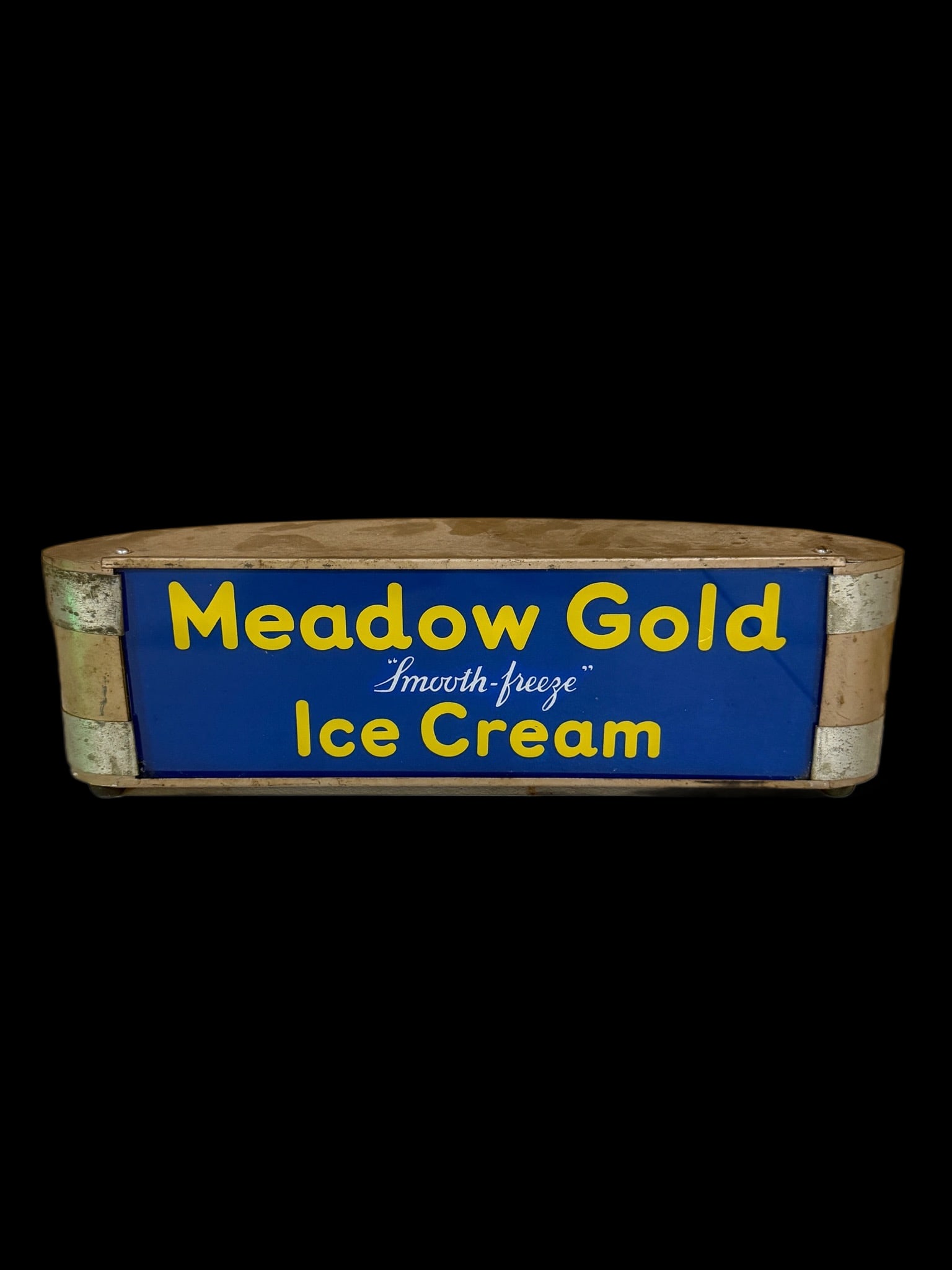 Meadow Gold Ice Cream Light Up Sign: Lights up as it should. Face has some shelf wear. Marked Gillco Signs. 15" H x 5" W x 4" D. All items are eligible for free delivery to Rustbelt Americana in East Moline, IL on 8/6-7 or other shows