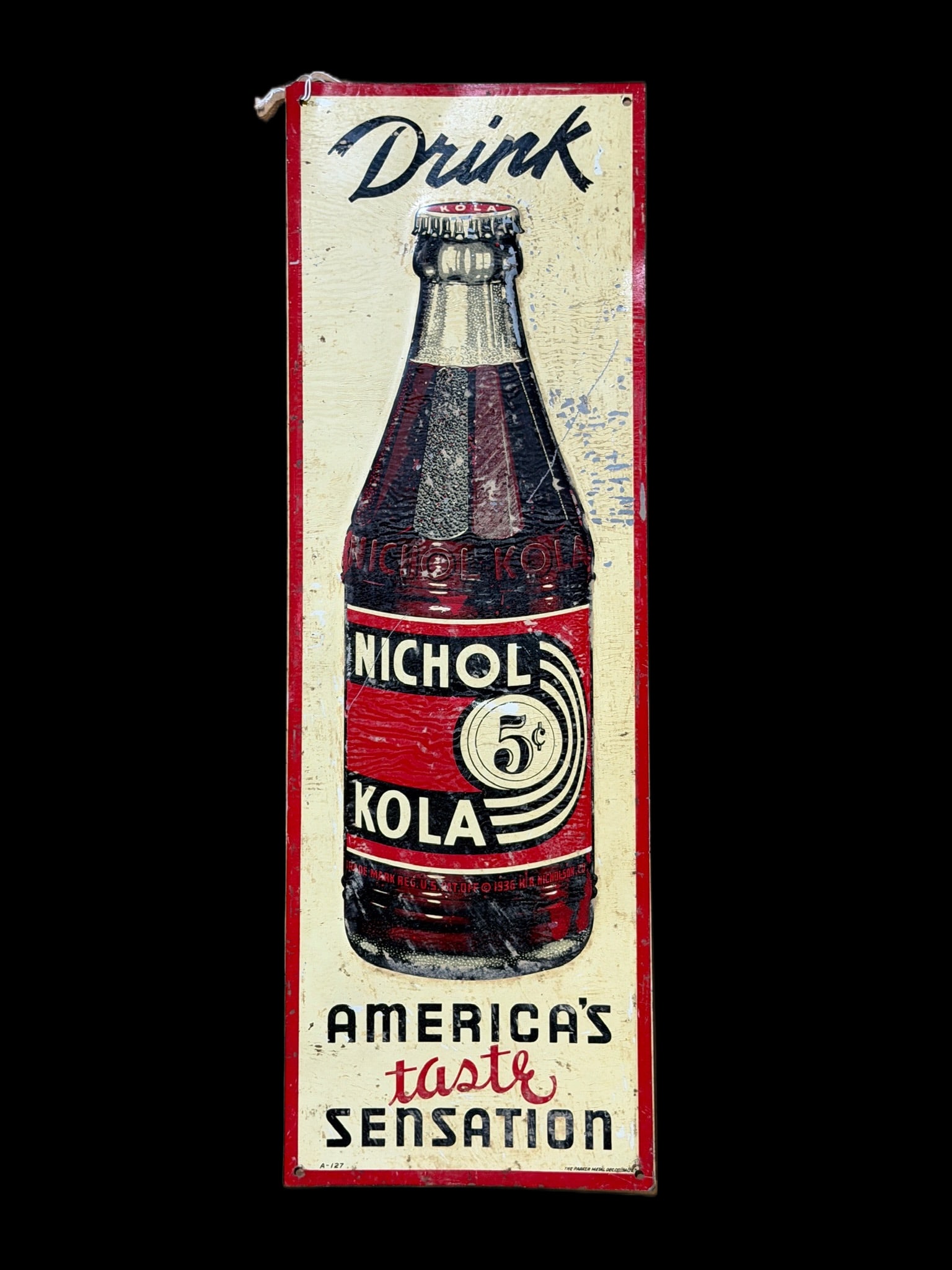 Nichol Kola Taste Sensation Soda Sign: Extreme wear throughout. Marked A-127. Heavy paper marks and a bend 3/4 of the way down. 24" H x 9" W. All items are eligible for free delivery to Rustbelt Americana in East Moline, IL on 8/6-7 or