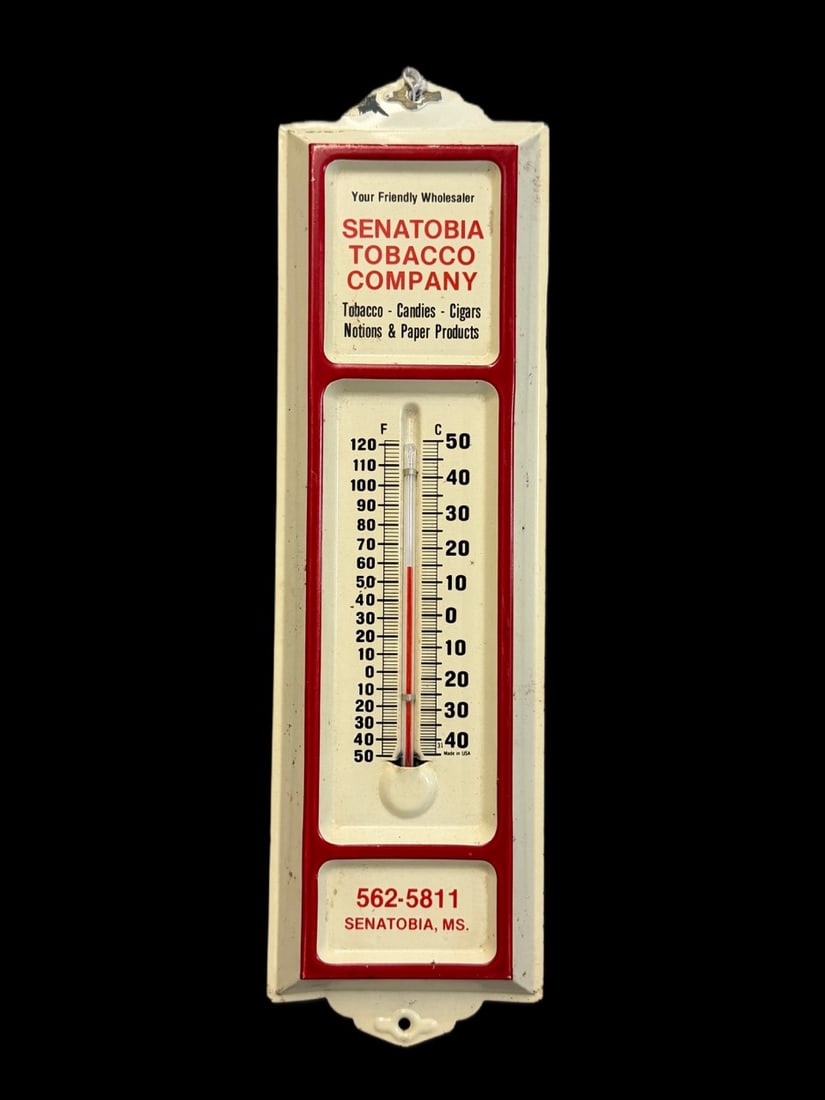 Senatobia Tobacco Company Thermometer: Light wear throughout. Tube reads low. 13" H x 4" W. All items are eligible for free delivery to Rustbelt Americana in East Moline, IL on 8/6-7 or other shows that Richmond Auctions attends. Size 13" 