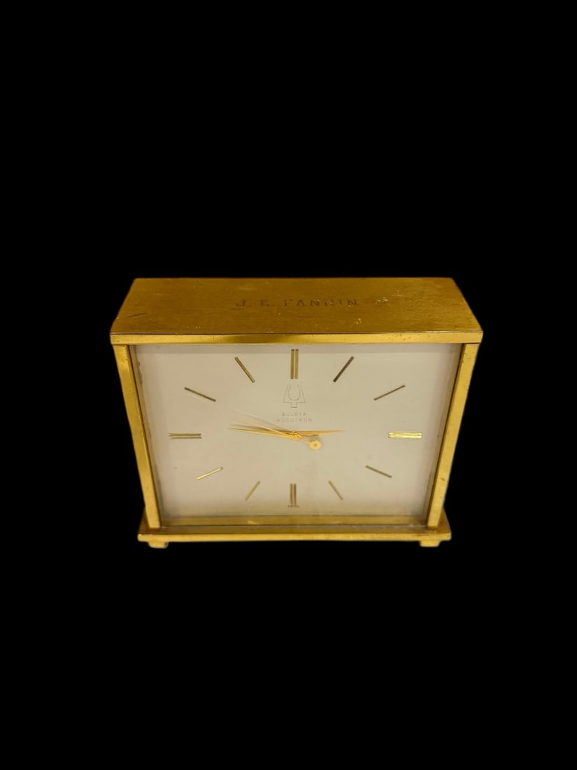 Bulova Accutron Clock: Marked D2051 R. Doesn't work, we did not try a new battery. 6" H x 5" W x 2" D. All items are eligible for free delivery to Rustbelt Americana in East Moline, IL on 8/6-7 or other shows that Richmond