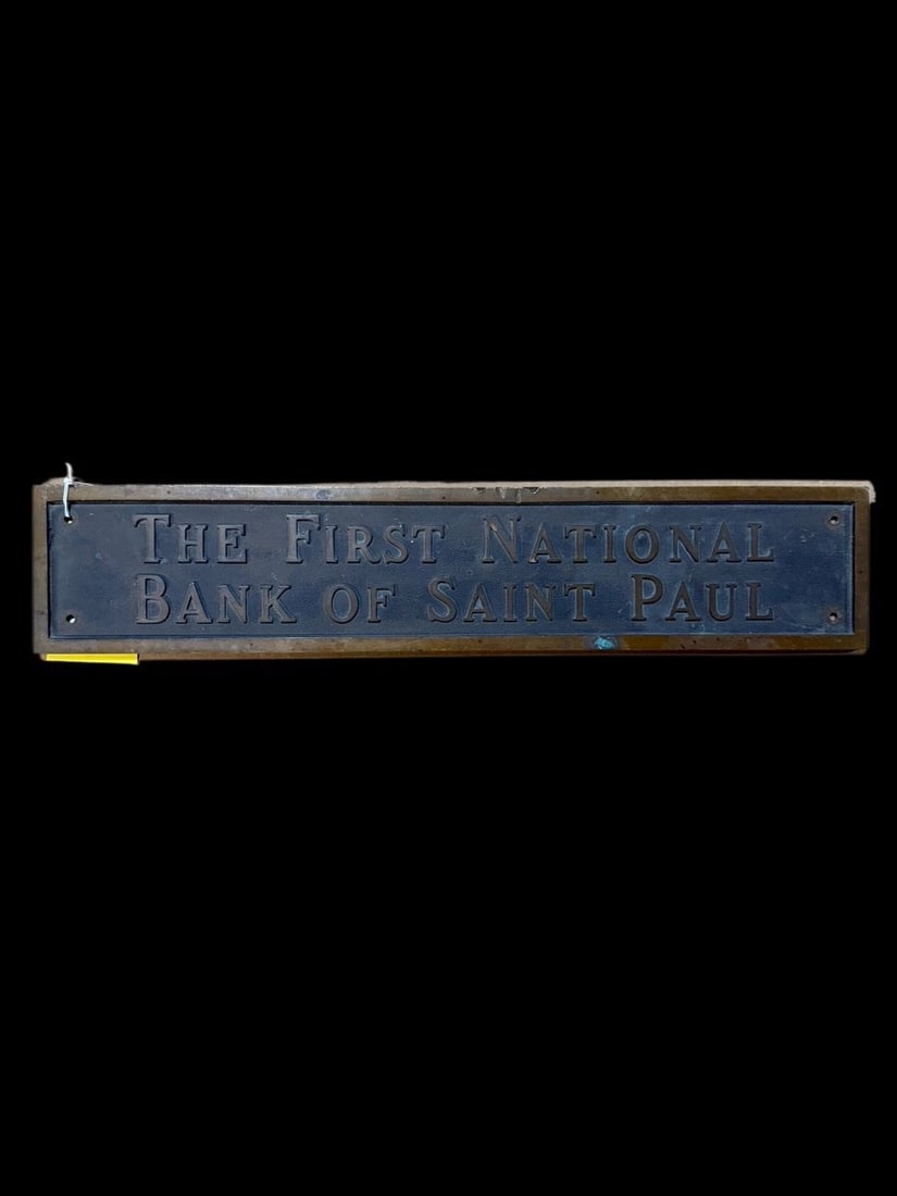 First National Bank Of Saint Paul Sign: Very heavy. Wear on edges. 23" H x 5" W. All items are eligible for free delivery to Rustbelt Americana in East Moline, IL on 8/6-7 or other shows that Richmond Auctions attends. Size 23" H x 5" W