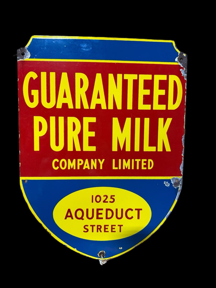 Guaranteed Pure Milk Company Sign: Chips around mounting holes and light scratching throughout. 14" H x 9" W. All items are eligible for free delivery to Rustbelt Americana in East Moline, IL on 8/6-7 or other shows that Richmond