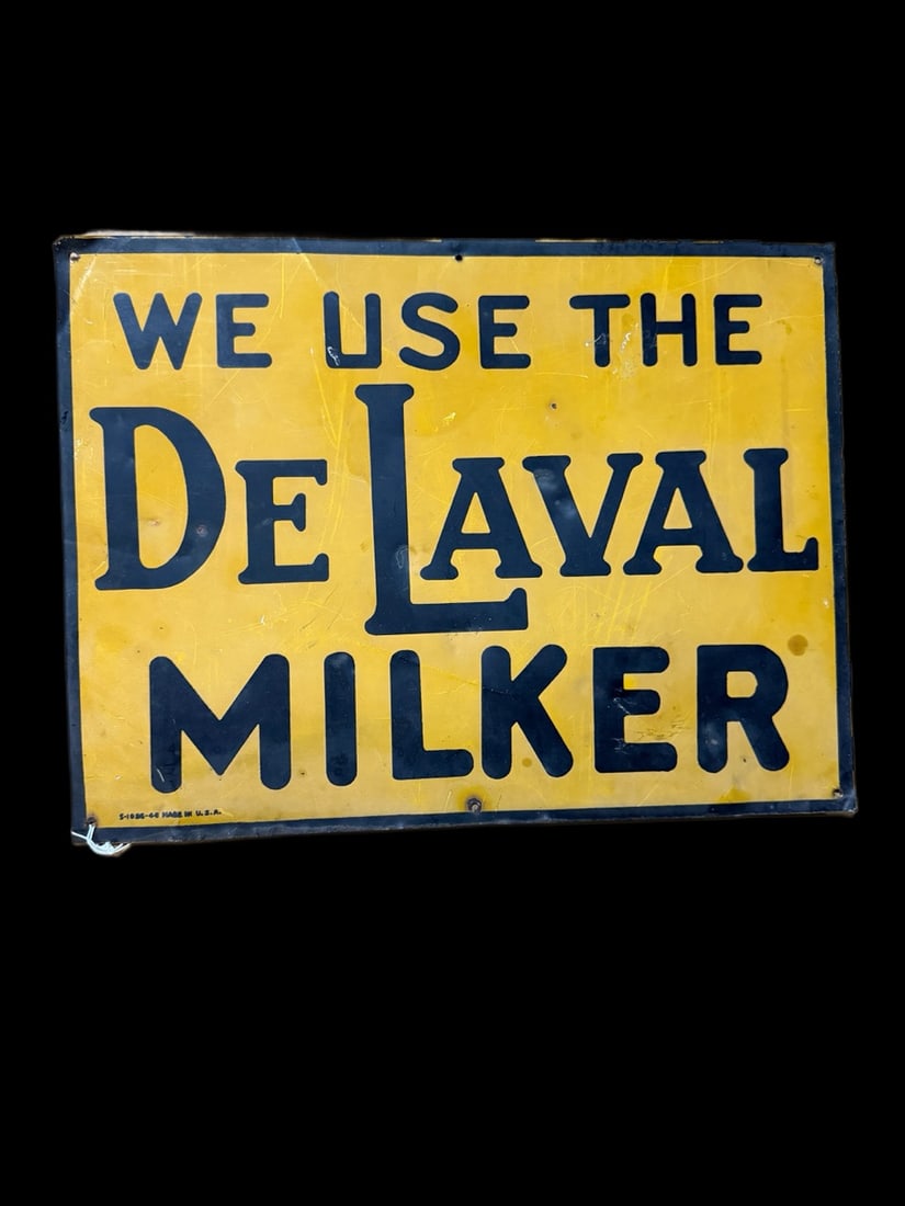 Delaval Milker Farming Sign: Marked S1096 Fading and scratches throughout. 16" H x 12" W. All items are eligible for free delivery to Rustbelt Americana in East Moline, IL on 8/6-7 or other shows that Richmond Auctions attends.