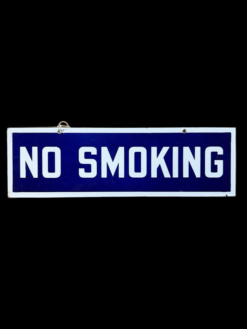 No Smoking Porcelain Sign: Slight edge wear and chips on edge. 6" H x 18" W. All items are eligible for free delivery to Rustbelt Americana in East Moline, IL on 8/6-7 or other shows that Richmond Auctions attends. Size 6" H x