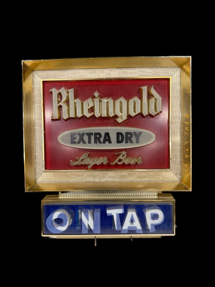 Rheingold Extra Dry Lager Beer Light Up Sign: Takes 5 seconds to light up. Has typical wear from use, presents well. 17" H x 16" W x 5" D. All items are eligible for free delivery to Rustbelt Americana in East Moline, IL on 8/6-7 or other shows