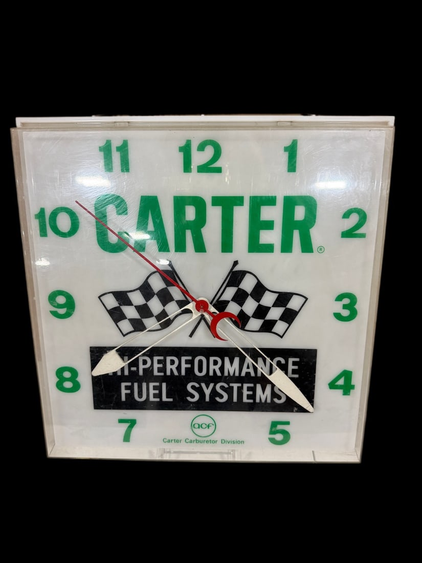 Carter High Performance Fuel System Plastic Clock: Lights up, lots of scratches on face. Mechanism works. 15" H x 15" W x 5" D. All items are eligible for free delivery to Rustbelt Americana in East Moline, IL on 8/6-7 or other shows that Richmond Auc