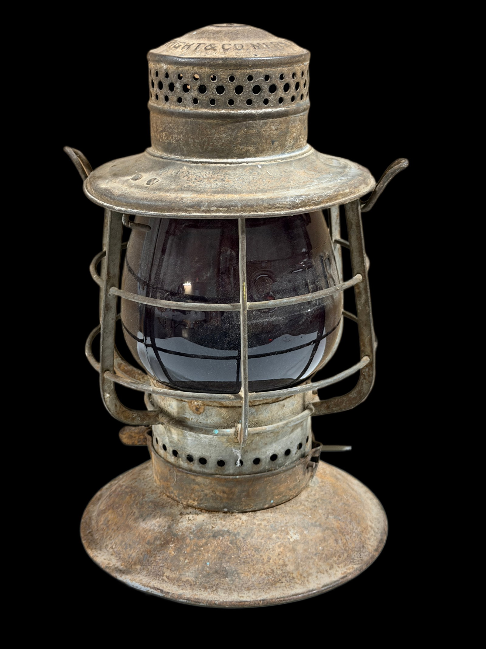 1920's E.T. Wright Grand Trunk Railroad Lantern Lamp: Circa 19020's Ruby red globe embossed GTR. Frame embossed ET Wright. Heavy oxidation. Missing bail handle. 11" H x 7" W. All items are eligible for free delivery to Rustbelt Americana in East Moline,