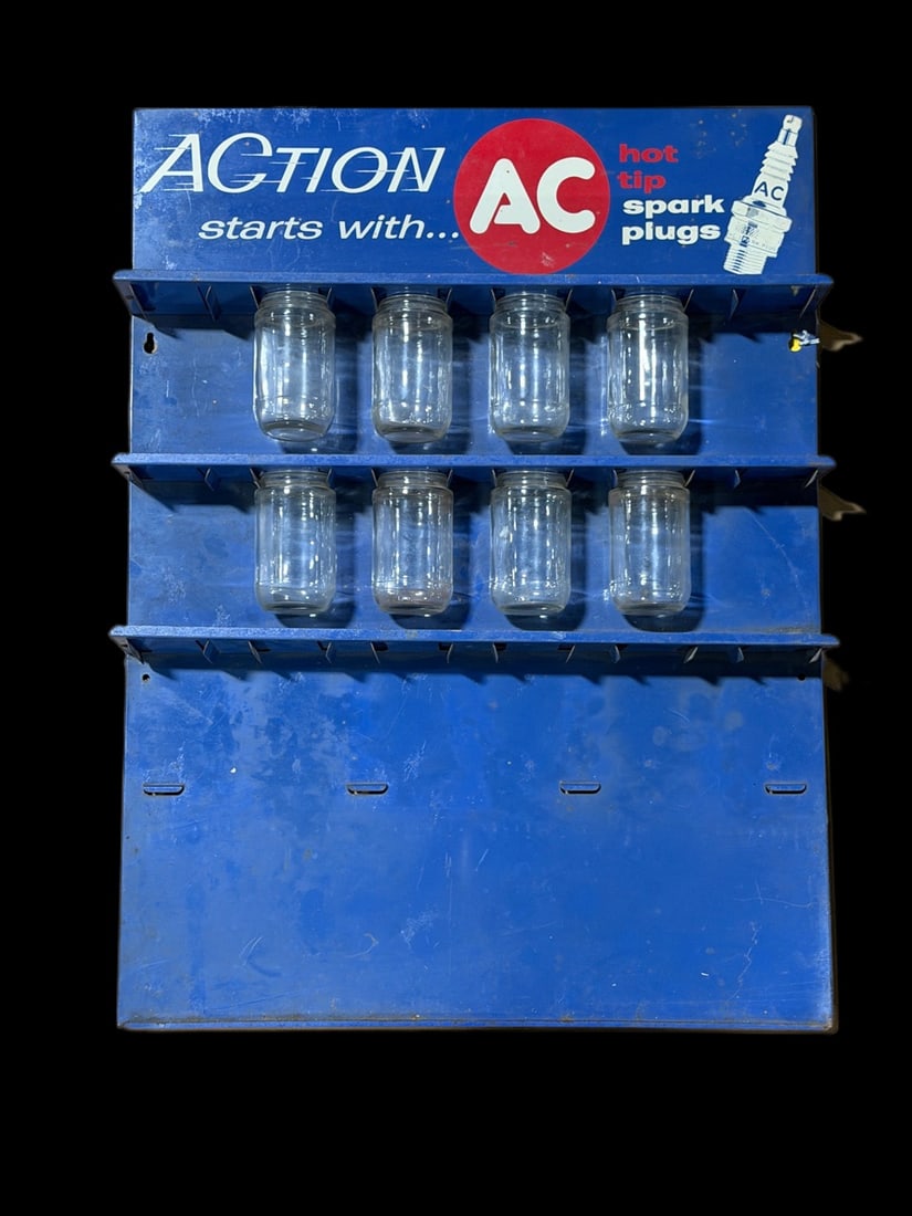 Ac Spark Plugs Hot Tip Auction Metal Display: Missing 1 row and glass bottles. Light scratching and paint loss in multiple spots. 24" H x 18" W x 3" D. All items are eligible for free delivery to Rustbelt Americana in East Moline, IL on 8/6-7 or