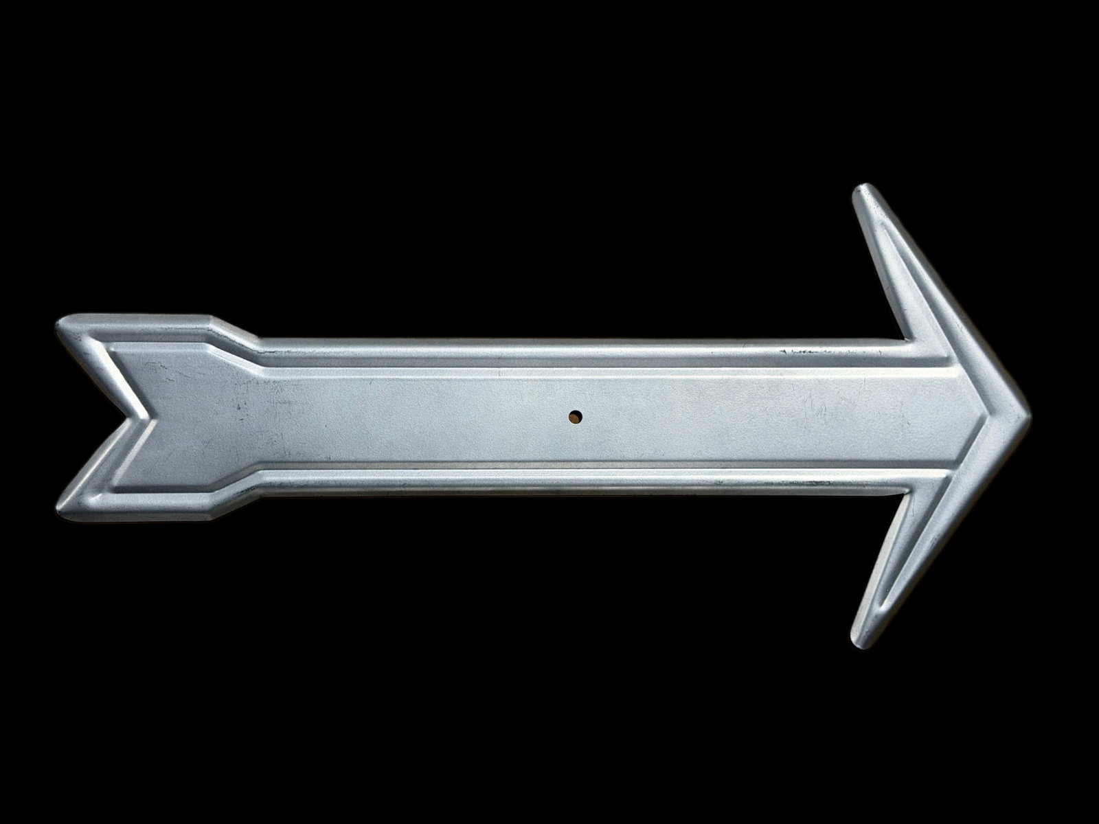 Coca Cola Coke Soda Button Arrow: The arrow that goes on the back of various Coke buttons. Has scratching on ribbed edges and on main part of arrow. 20" H x 10" W. All items are eligible for free delivery to Rustbelt Americana in East