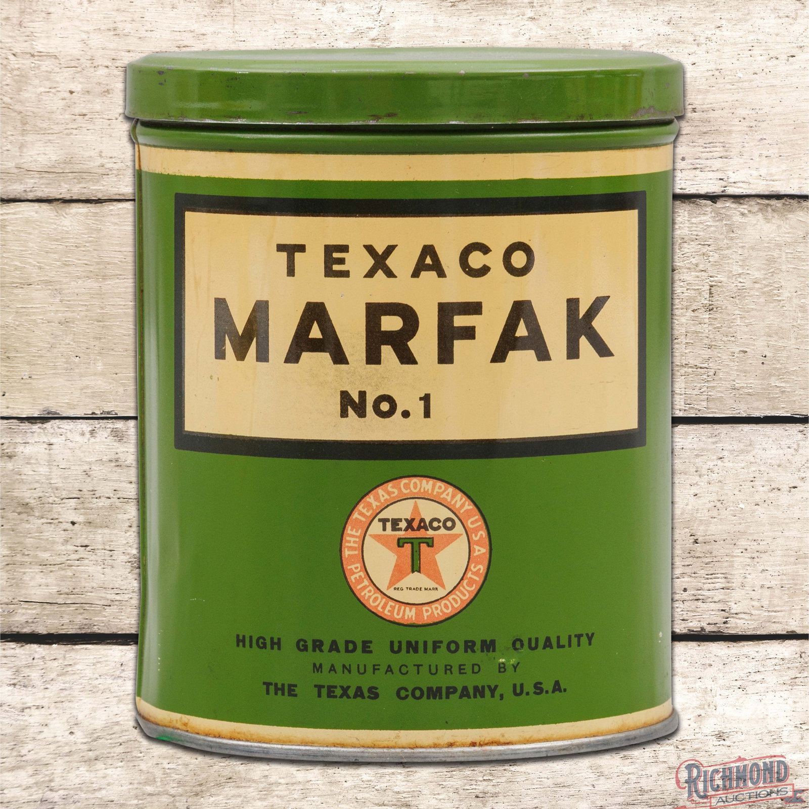 Texaco Marfak No 1 2 Pound Empty Metal Grease Can w/ Logo: Empty metal two-pound can with the original lid has very good color and shine. The display has toning with slight fading to the logo. The lower left edge has a minor indentation. The reverse is clean.