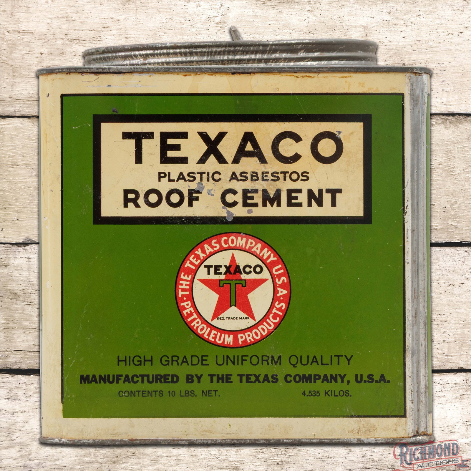 Texaco Roof Cement 10 Pound Metal Advertising Can: Ten pound metal can with the original lid retains some product inside. The can has very good color and shine. The display has light wear with toning, minor discoloration along the lower edges and an i