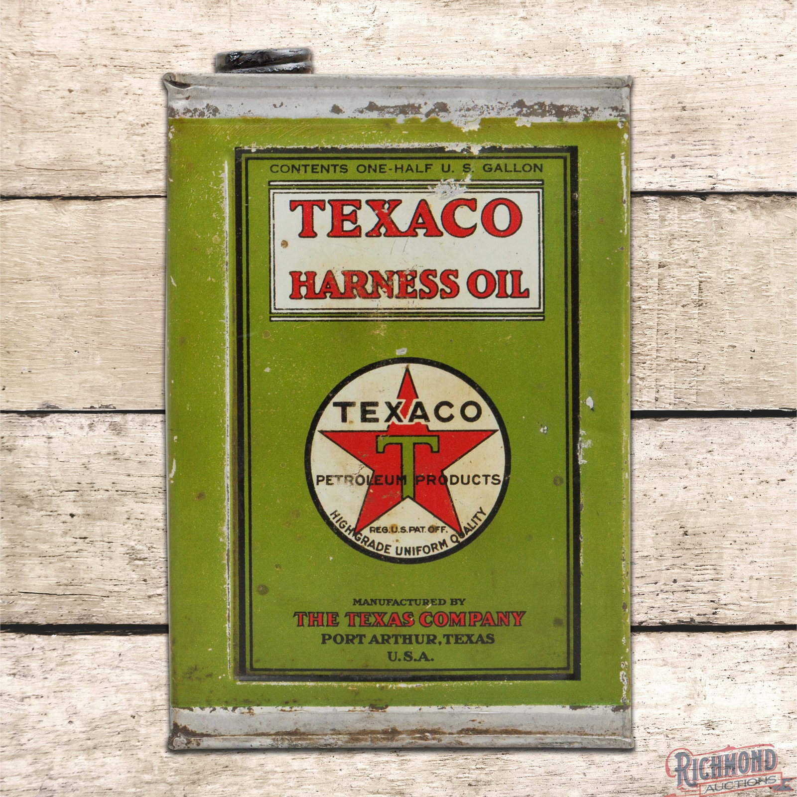 Early The Texas Company Texaco Harness Oil Half Gallon Empty Metal Can "Port Arthur Texas": Empty half-gallon metal can has good color and shine. The display has light wear with small paint chips and small areas of discoloration. The reverse has additional wear with wash in the logo. The cap