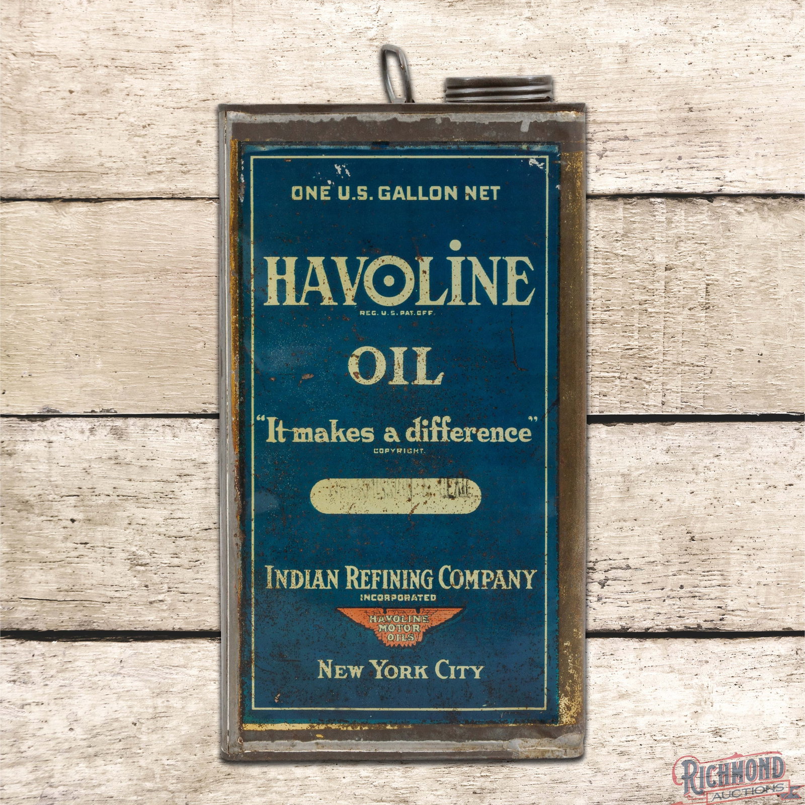Havoline Oil Indian Refining Company Empty 1 Gallon Metal Can: Empty metal can has good color and shine. The display has light wear throughout with oxidation and small indentations. The reverse has similar wear. The handle and cap are present. The can displays ve