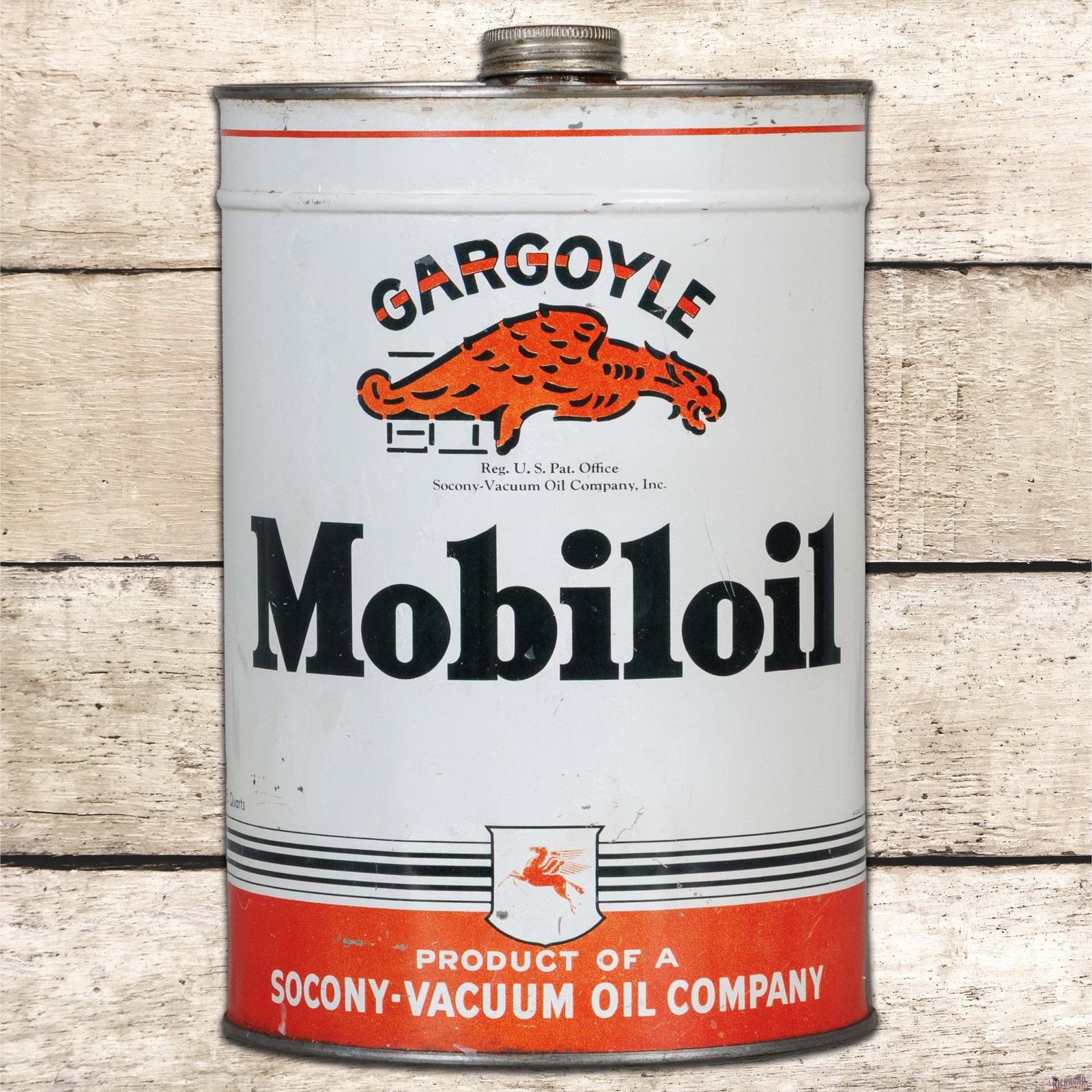 Gargoyle Mobiloil "AF" Empty 5 Quart Metal Oil Can: Empty metal five-quart can has good color and shine. The display has light wear with tiny paint chips and discoloration on the lower left edge. The reverse has slight fading in the fields with wash in
