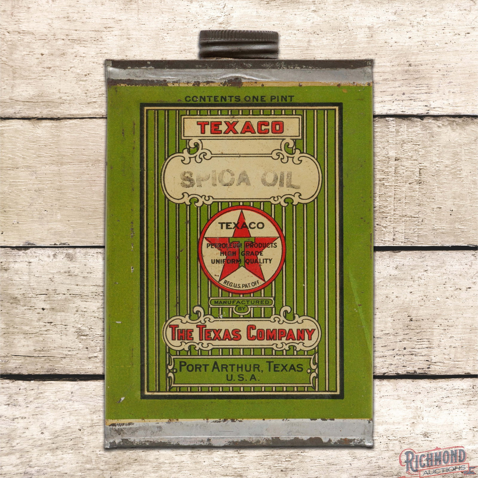 Texaco The Texas Company Spica Oil Empty Pint Metal Can: Empty metal pint can with the original cap has very good color and shine. The display has light wear with toning, small paint chips and a light bend in the left field. The reverse is in a similar cond