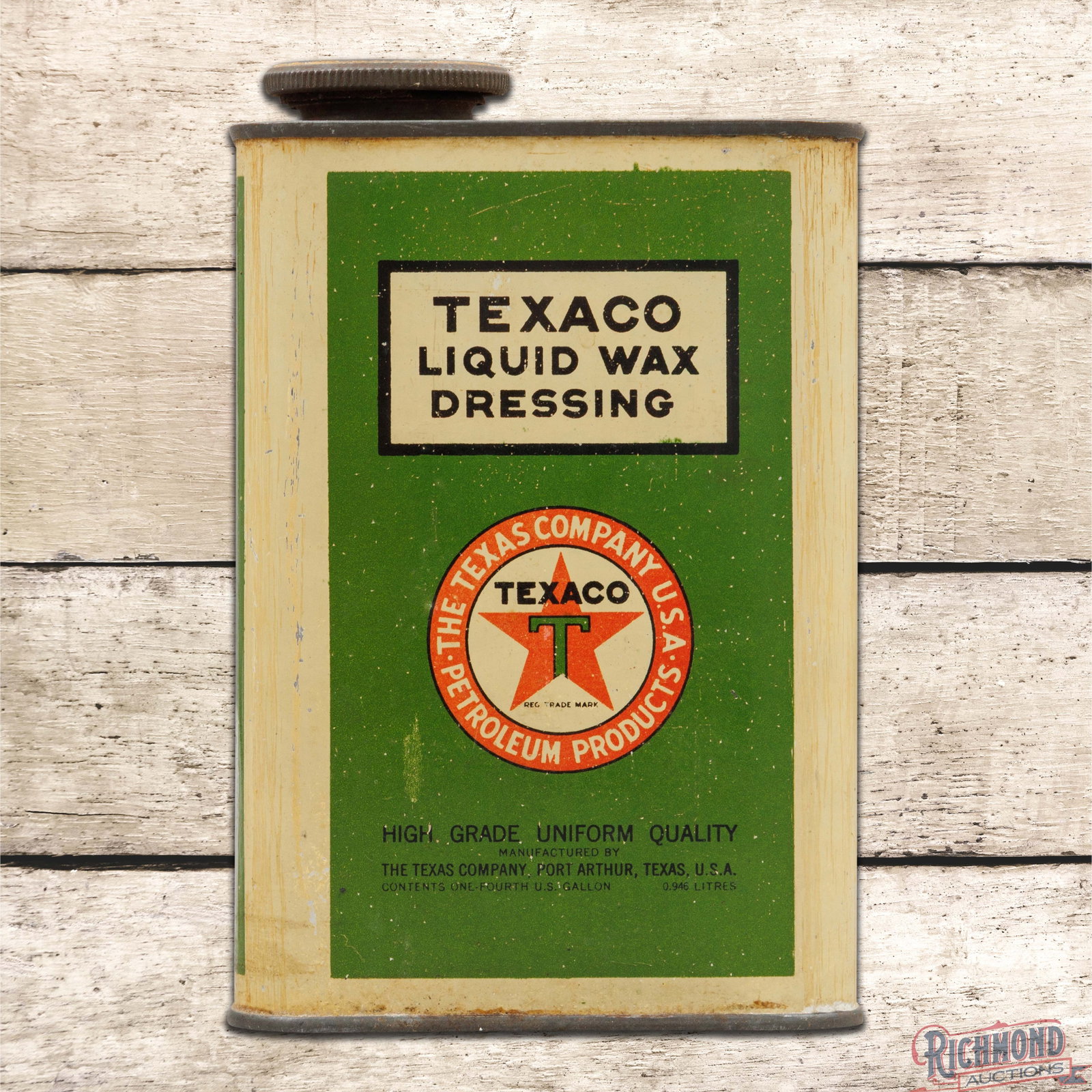 Texaco Liquid Wax Dressing Empty 1 Quart Metal Can w/ Logo: Empty one quart metal can with the original lid has very good color and shine. The display has light wear with tiny paint chips. The reverse is in a similar condition with additional wear along the lo
