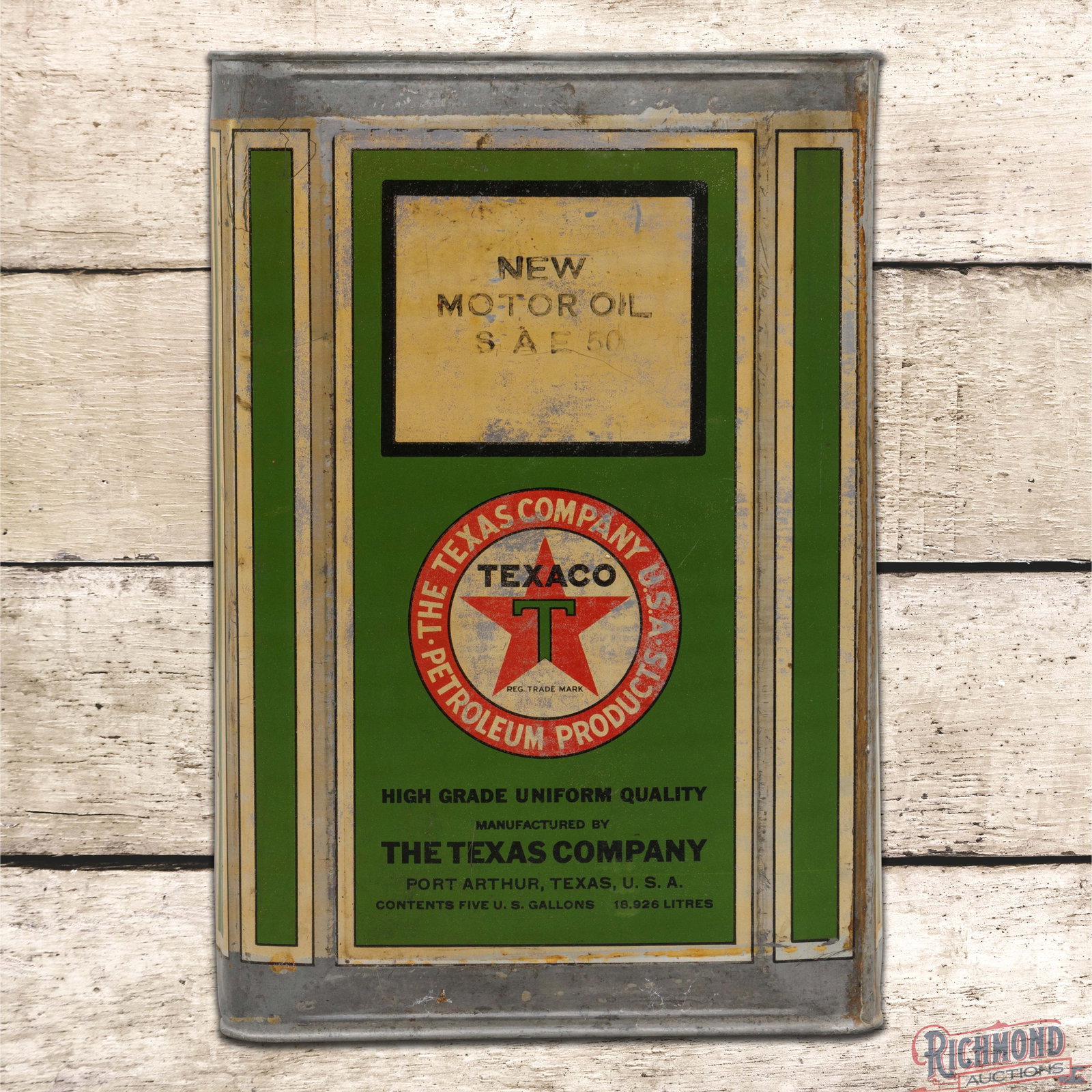 The Texas Company Texaco 5 Gallon Empty Metal Can Port Arthur w/ Logo: Empty five-gallon metal can has good color and shine. The can retains the original handle. The cap is missing and the cap opening has loss on the inside. The display has light wear with spotting and s