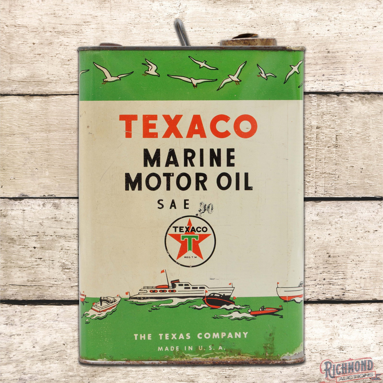 Texaco Marine Motor Oil Empty 1 Gallon Metal Can w/ Ships and Seagulls: Empty one gallon metal can has very good color and shine. The can retains the handle and caps. The display has light wear, minor fine scratches and wear along the lower edges. The reverse is in a simi
